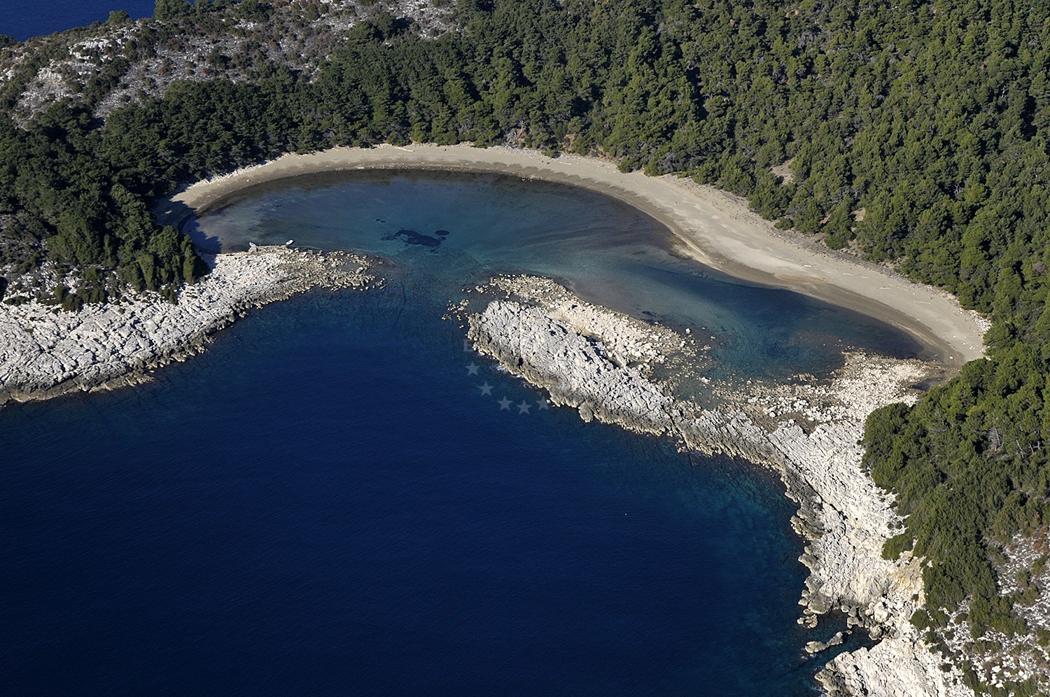 Limuni Quay in Saplunara, Mljet, Croatia with shallow waters and scenic coastal views