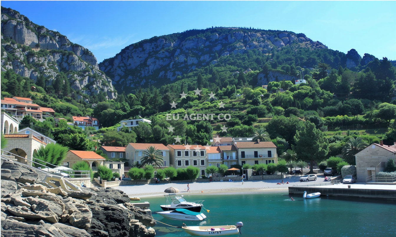 Yacht moored at Podobuce Quay with Bays Podobuce in the background