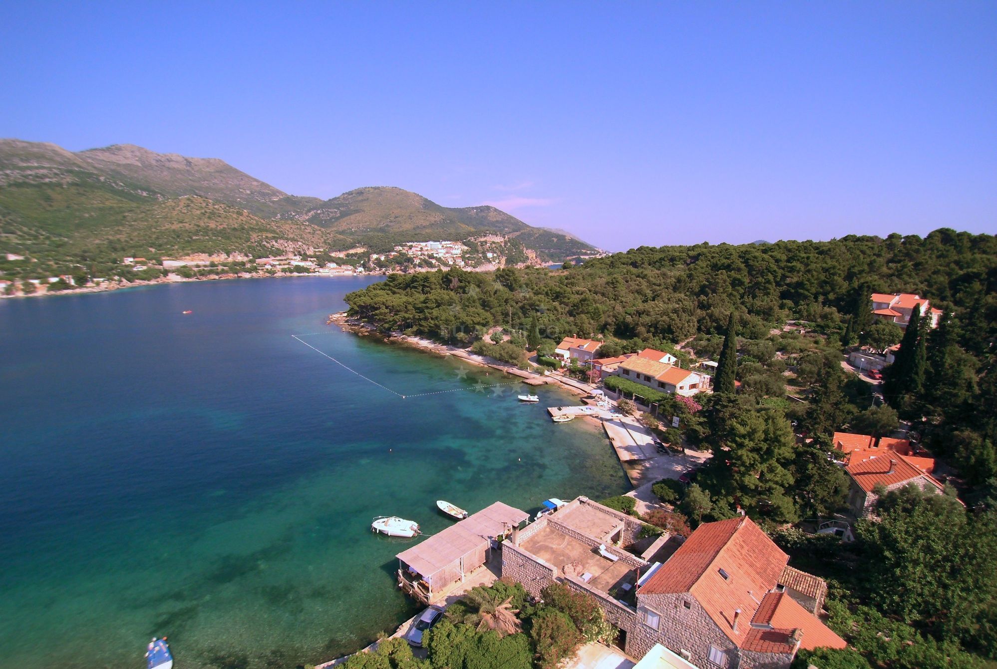 View of Konoba Kasar restaurant overlooking the Adriatic Sea from the jetty