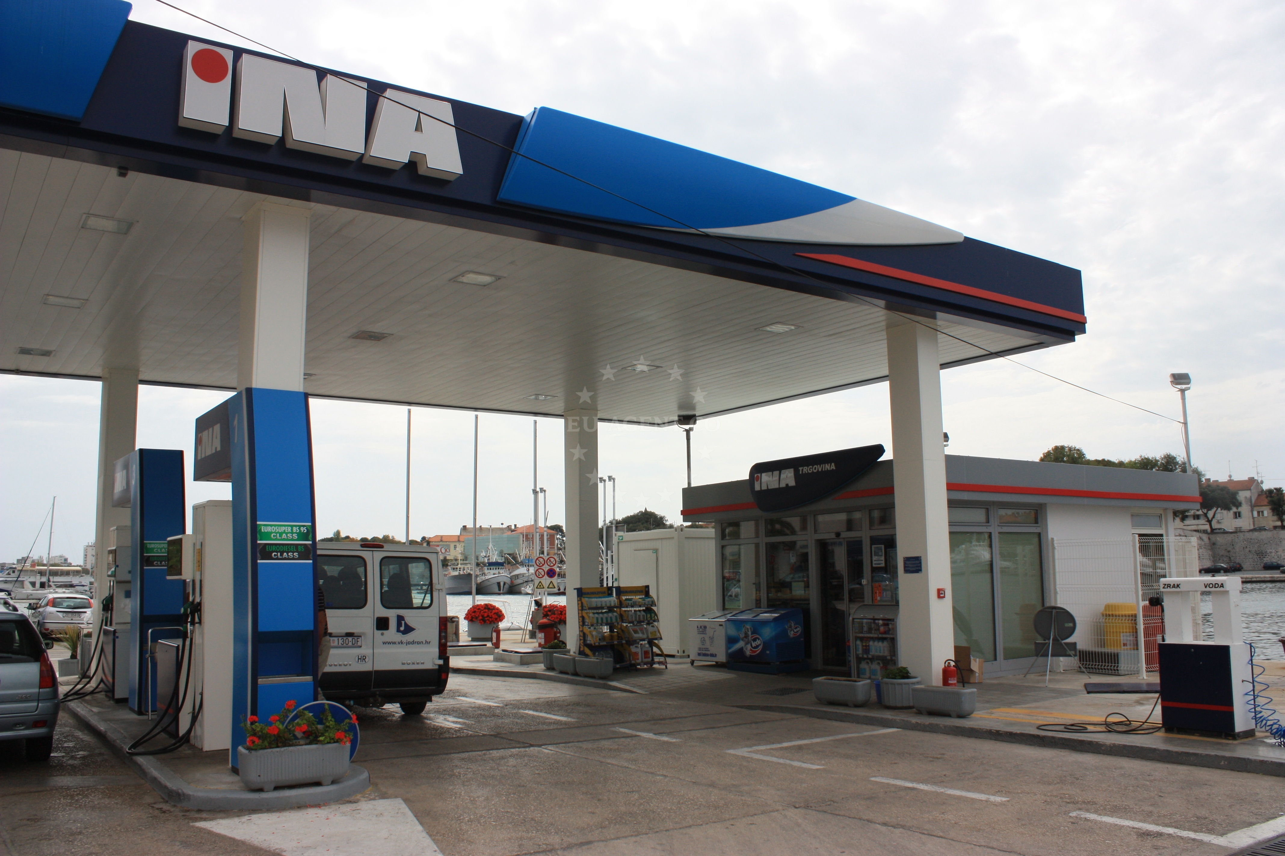 Fuel pumps and nautical view from Ina Station