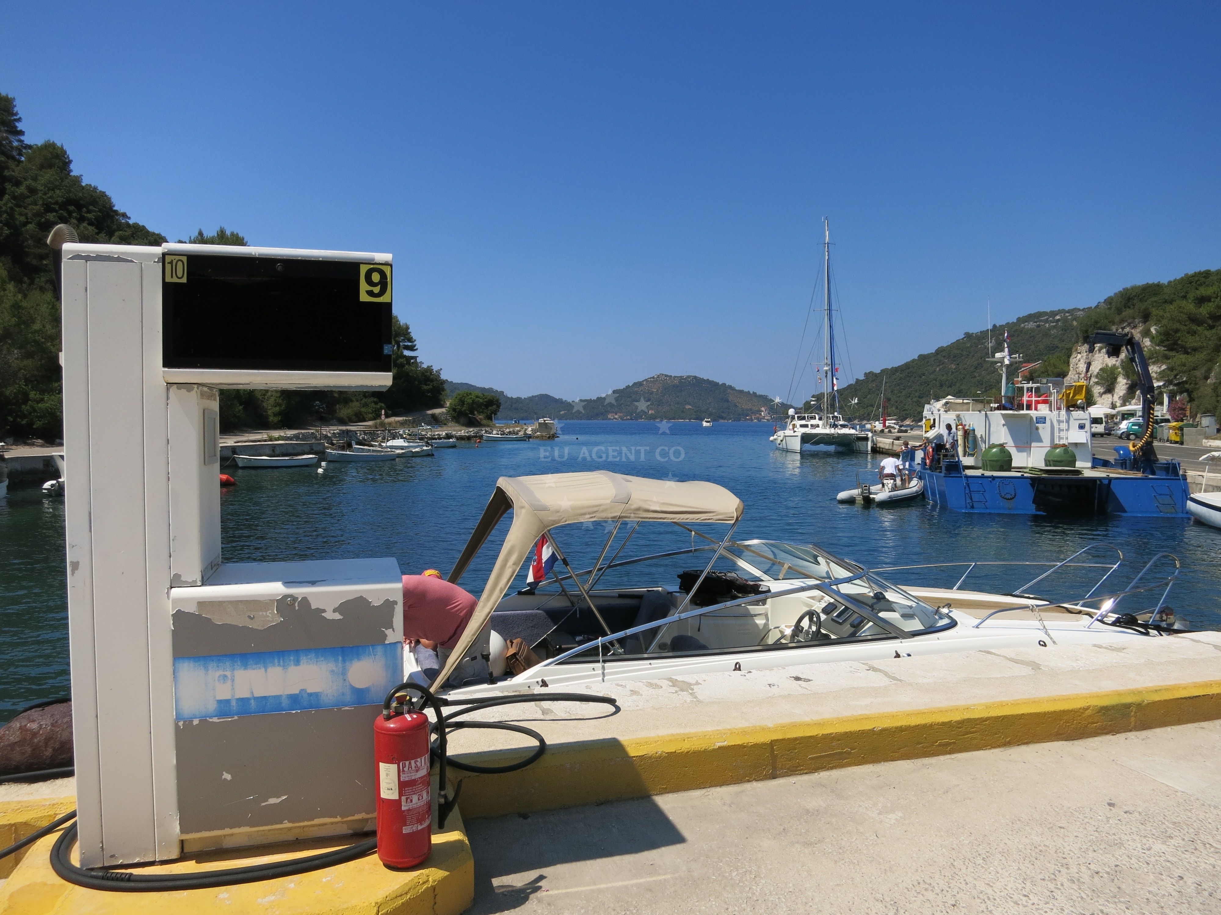 Fuel station facilities with Lastovo island backdrop
