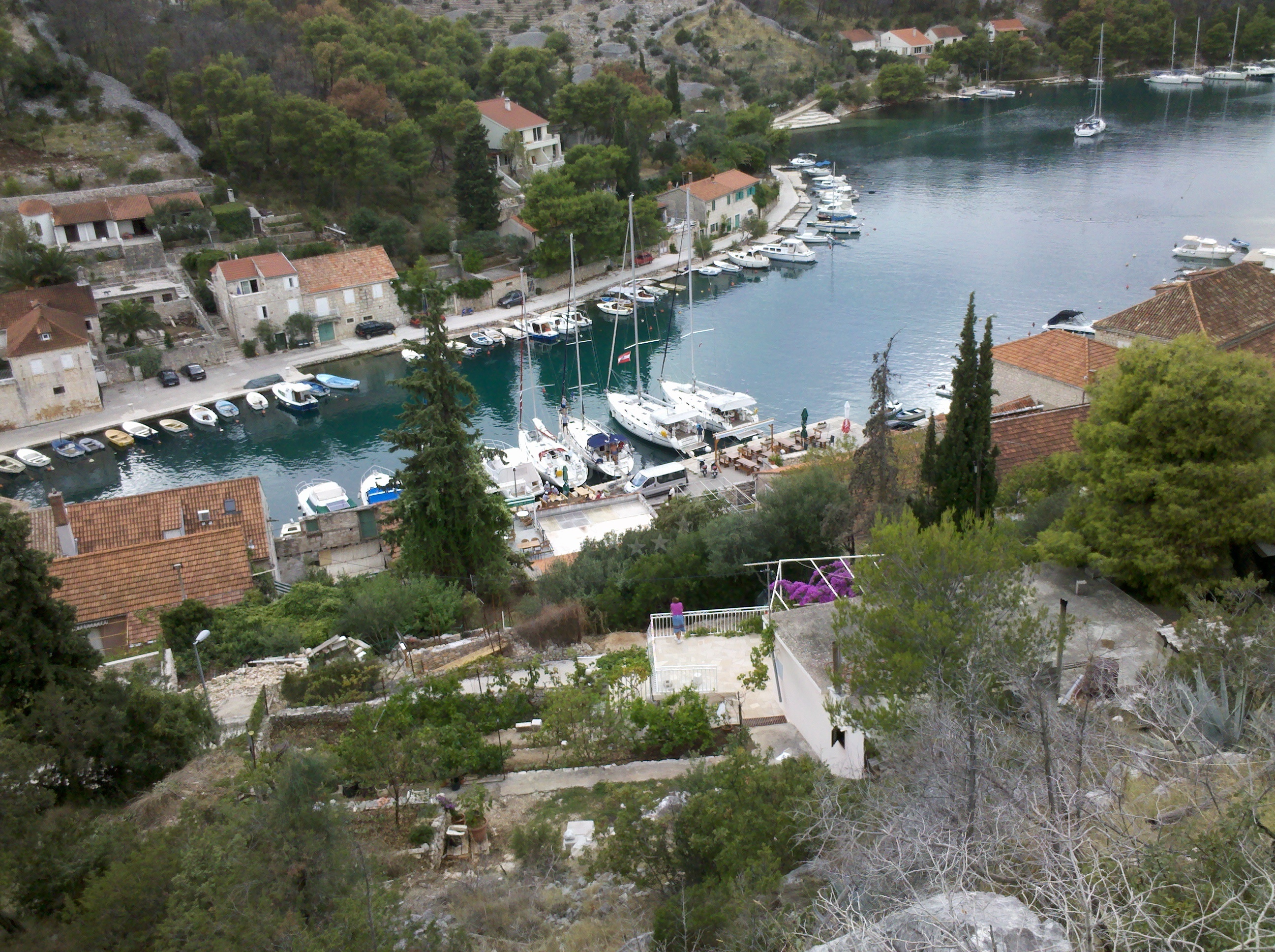 Bobovisce Harbour with moored yachts and nearby shoreline