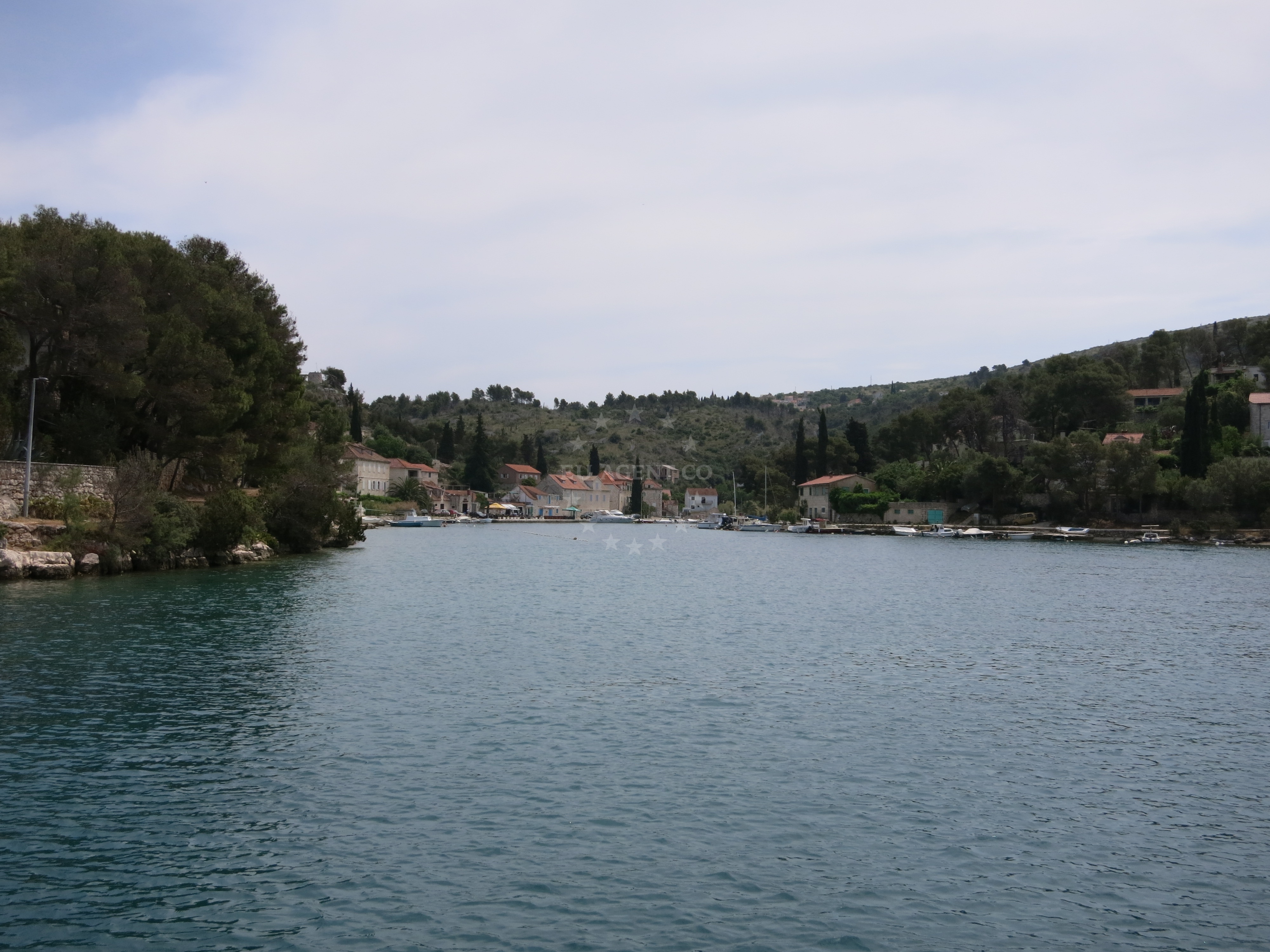 View of Bobovisce Harbour from the water with Brač Island in the background