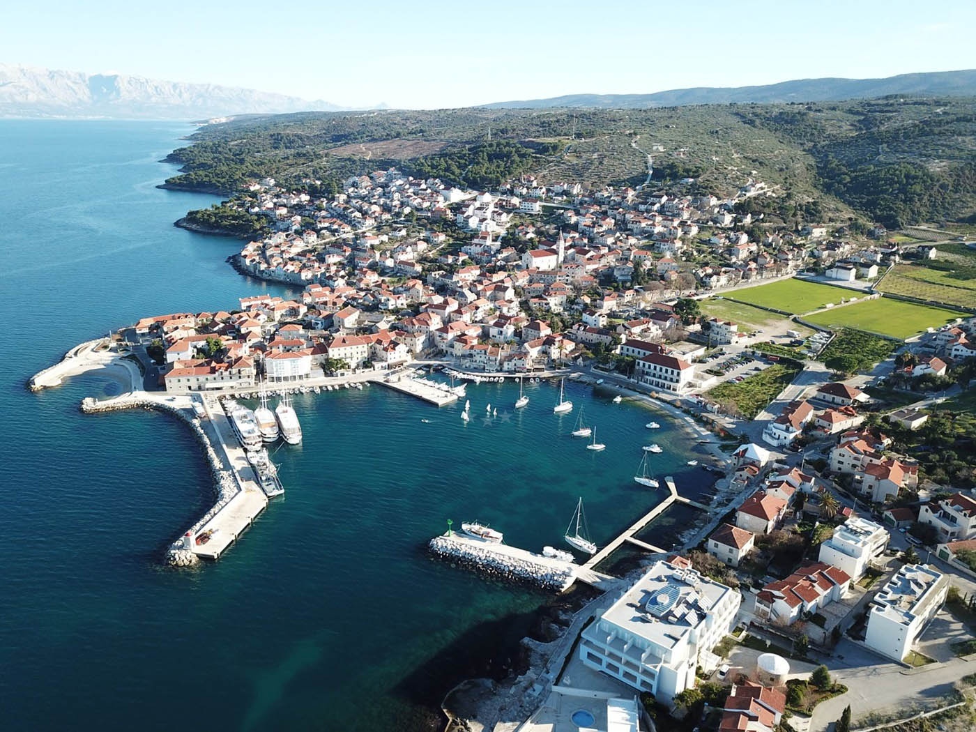 View of Brač mainland mountains from Postira Harbour