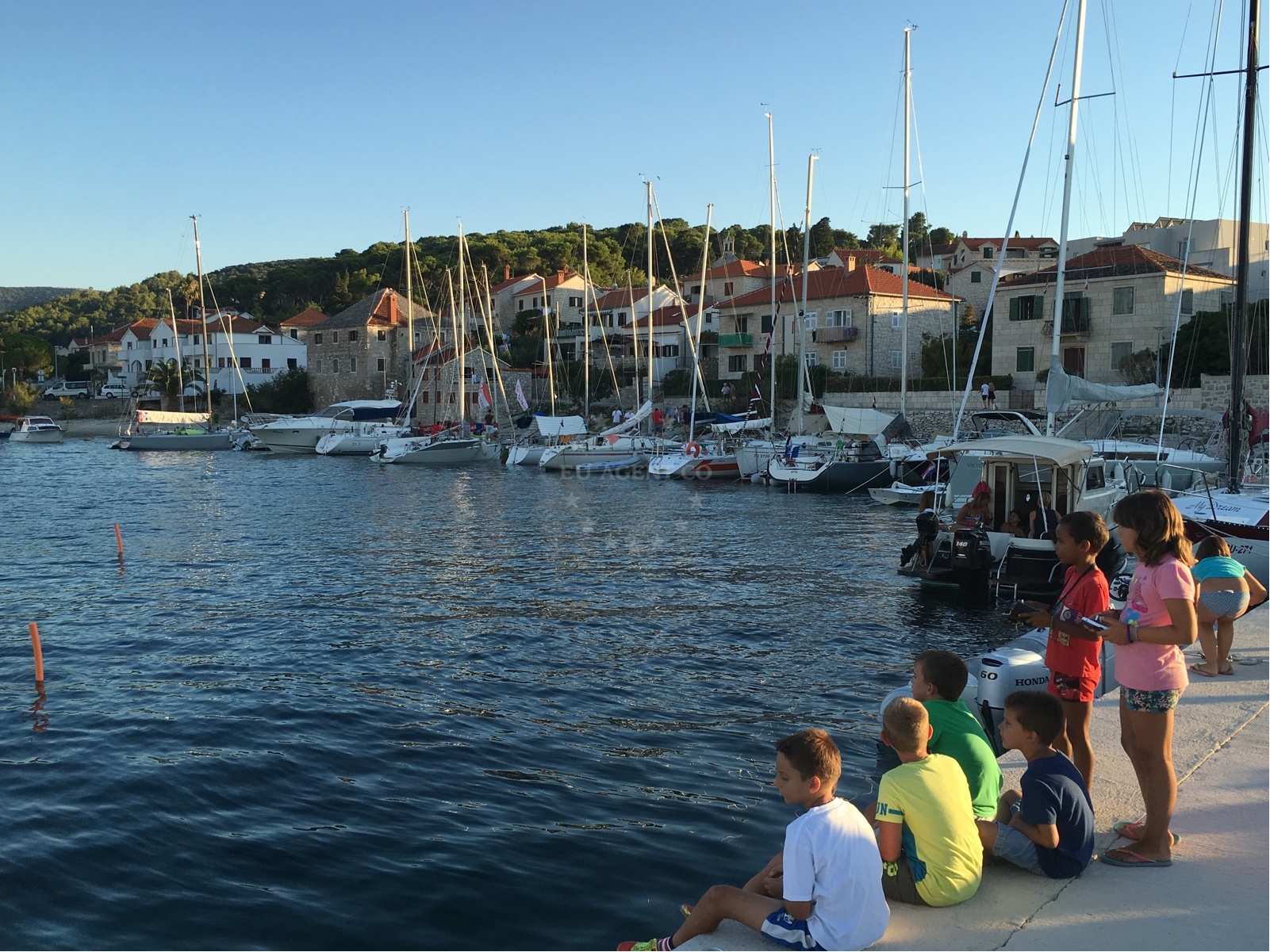 Additional view of Postira harbor in Harbour in Postira on the island Brač, Central Dalmatia, Croatia photo 13
