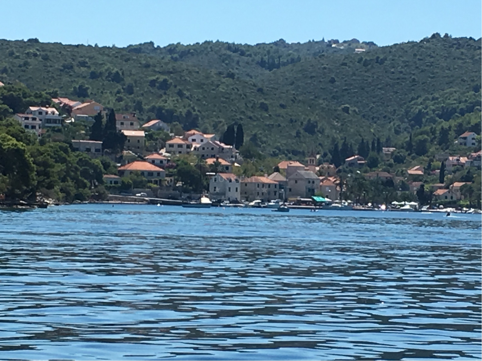 Facilities and surroundings at Splitska harbor in Harbour in Splitska on the island Brač, Central Dalmatia, Croatia photo 2