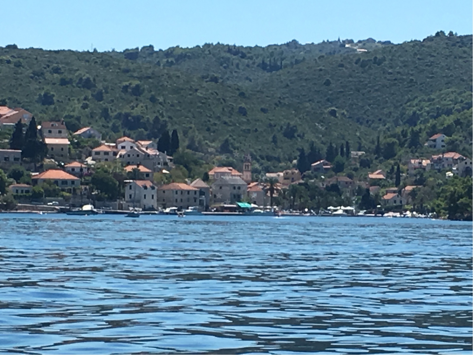 Approach and location view of Splitska harbor in Harbour in Splitska on the island Brač, Central Dalmatia, Croatia photo 3