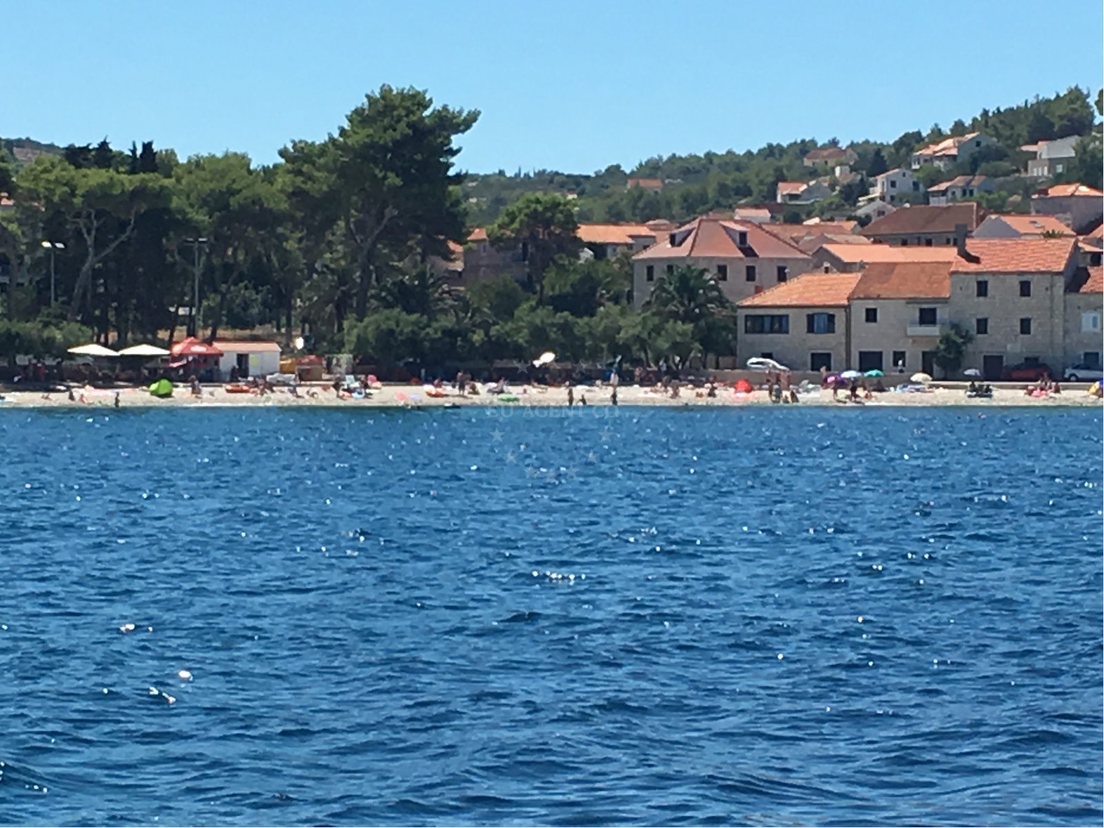 View of Sutivan Harbour with nearby cafes and restaurants