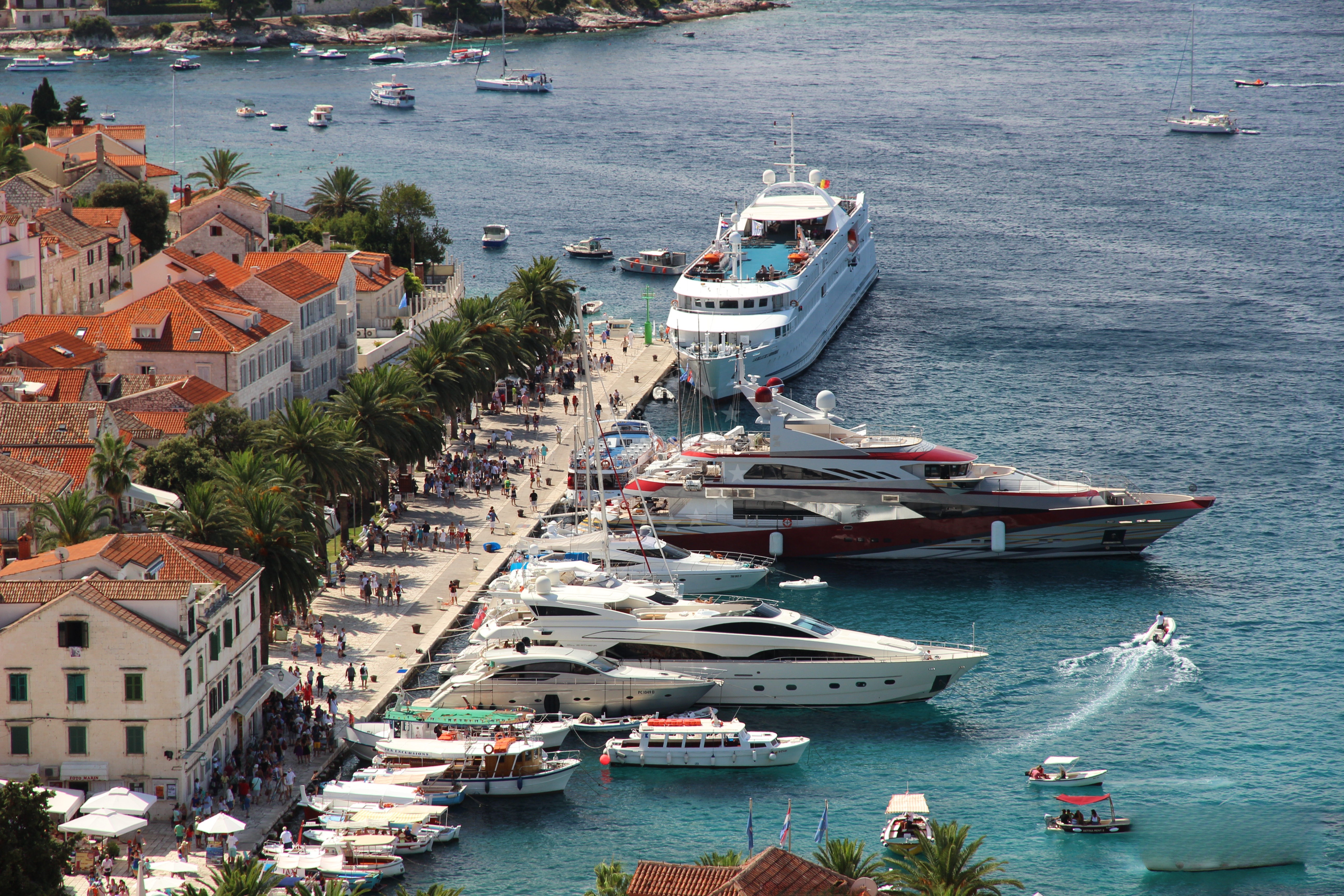 Hvar Harbour with boats docked and the castle in the background