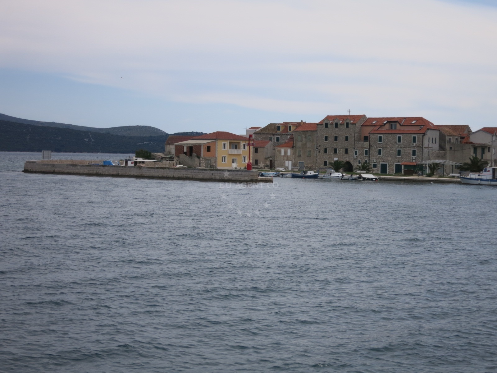 Shallow waters near Krapanj Harbour with visible shoals marked on nautical charts