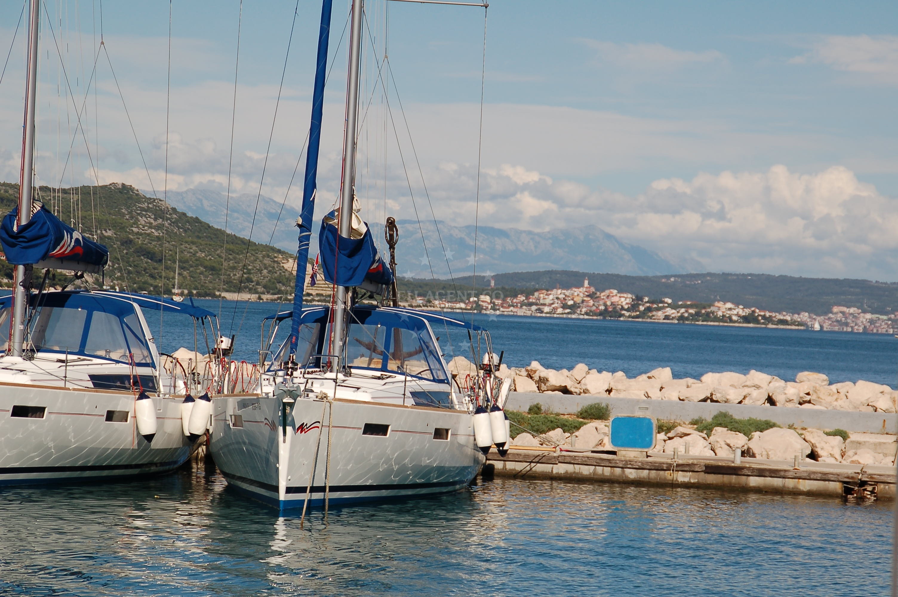 Sheltered harbor view with Trogir Bay in the distance