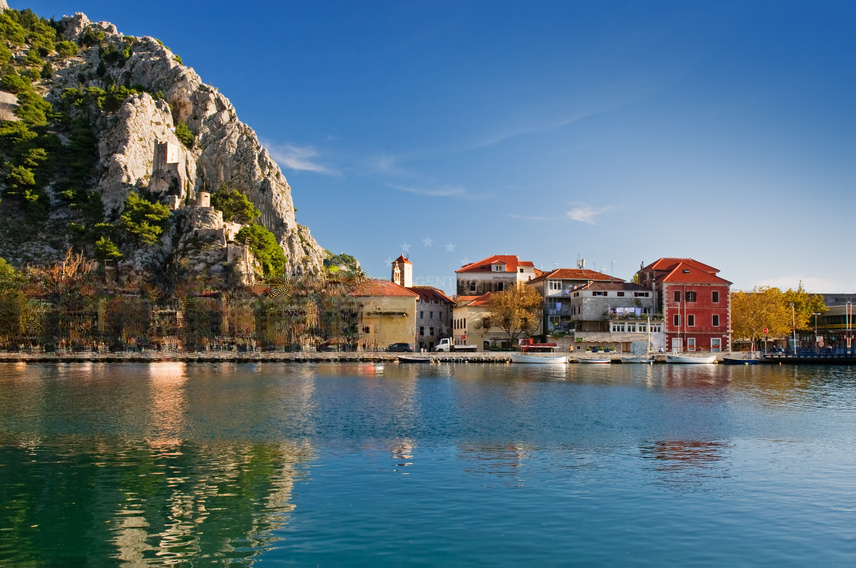 Omis Harbour jetty with yachts moored alongside