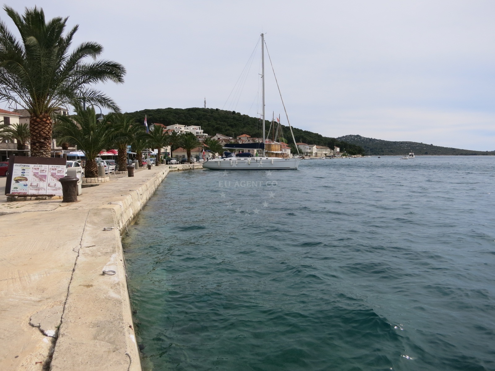 Rogoznica Harbour with moored yachts and the harbor office in the background