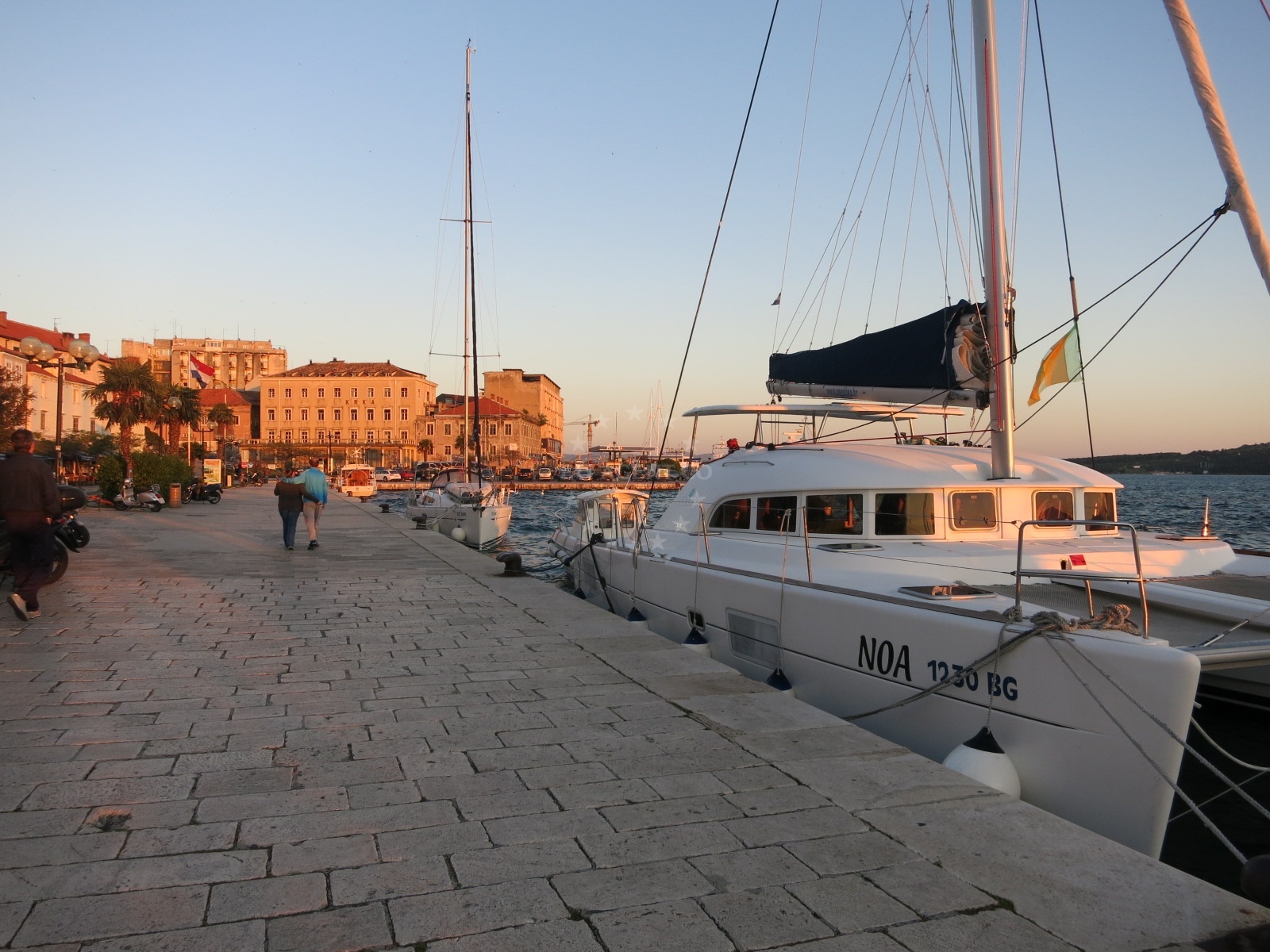 Historic buildings of Šibenik's old town visible from the harbor.