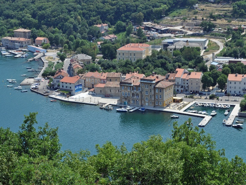 Bakar Harbour, Croatia with mooring lines and lit beacons marking the coal transport pipeline