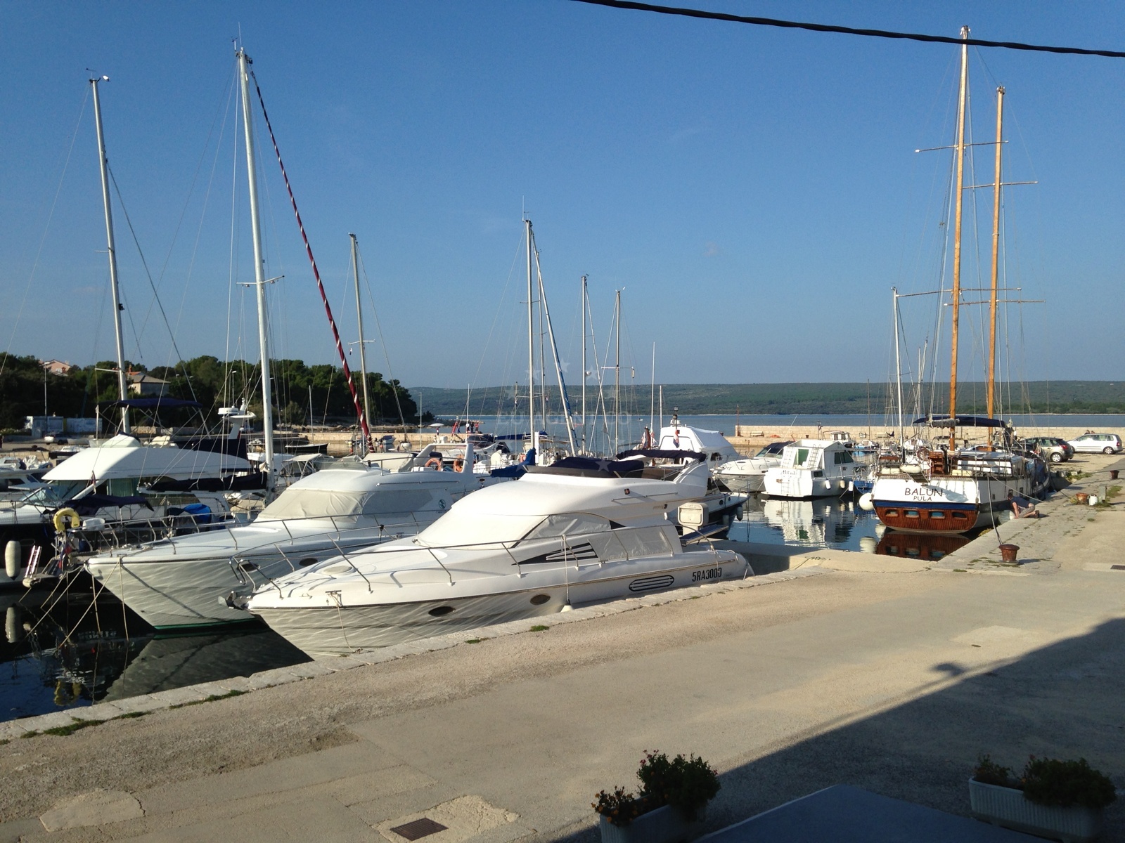 Nerezine Harbour with yachts moored at the jetty