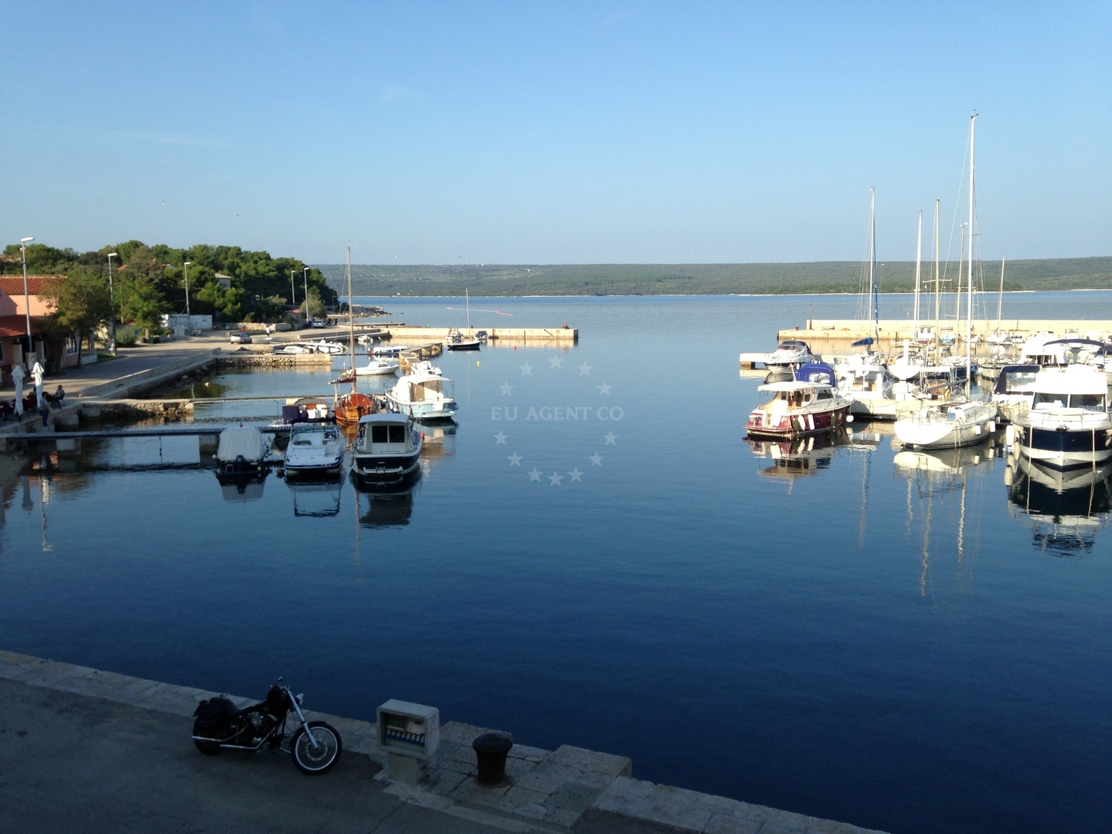 Boat crane and mooring lines at Nerezine Harbour