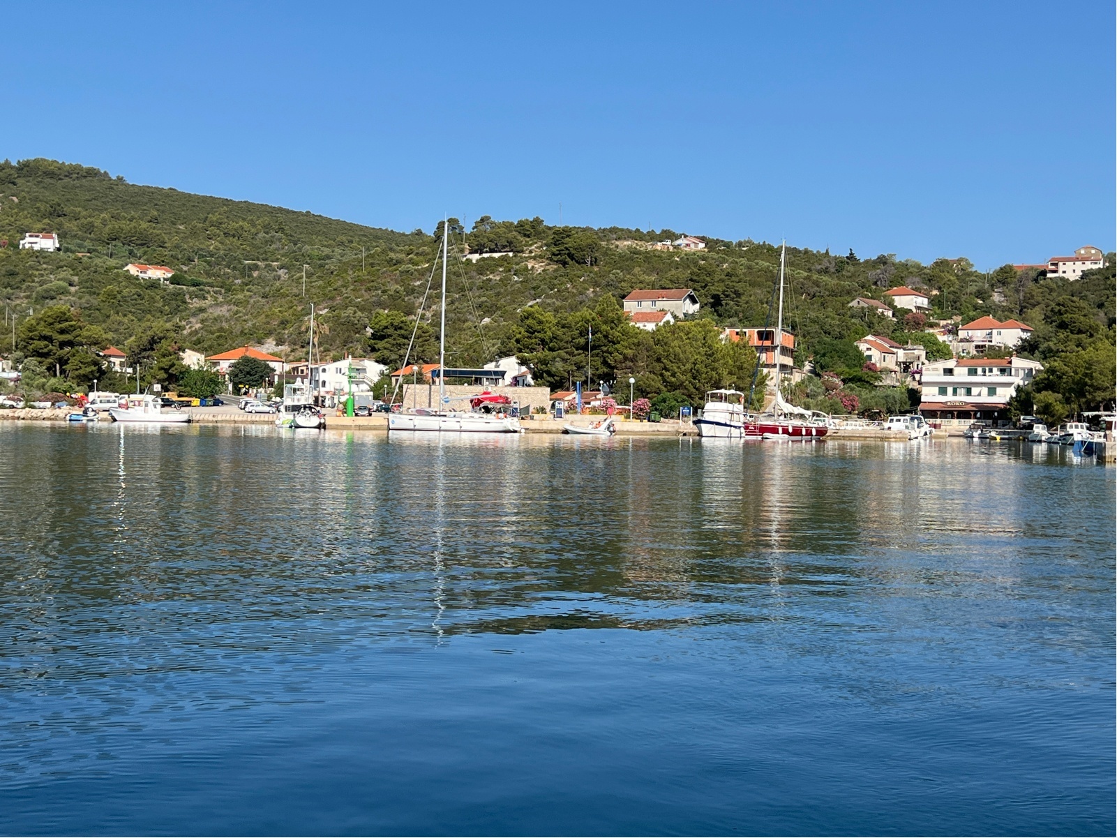 Harbour light and surrounding houses in Zaglav