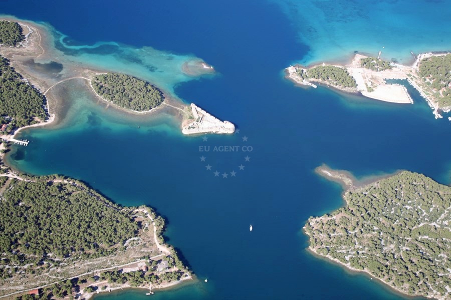 Jadria Harbour entrance with small boats moored near the shore
