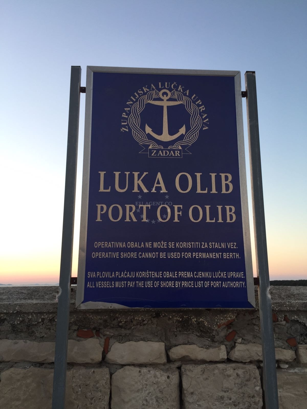 View of the harbor from the mainland with nearby Olib Beach