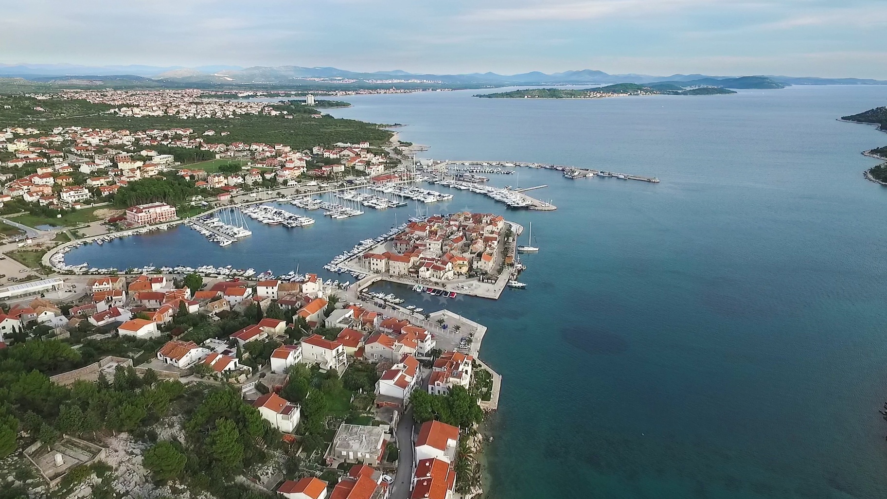 Marina Tribunj with moored yachts and harbor facilities