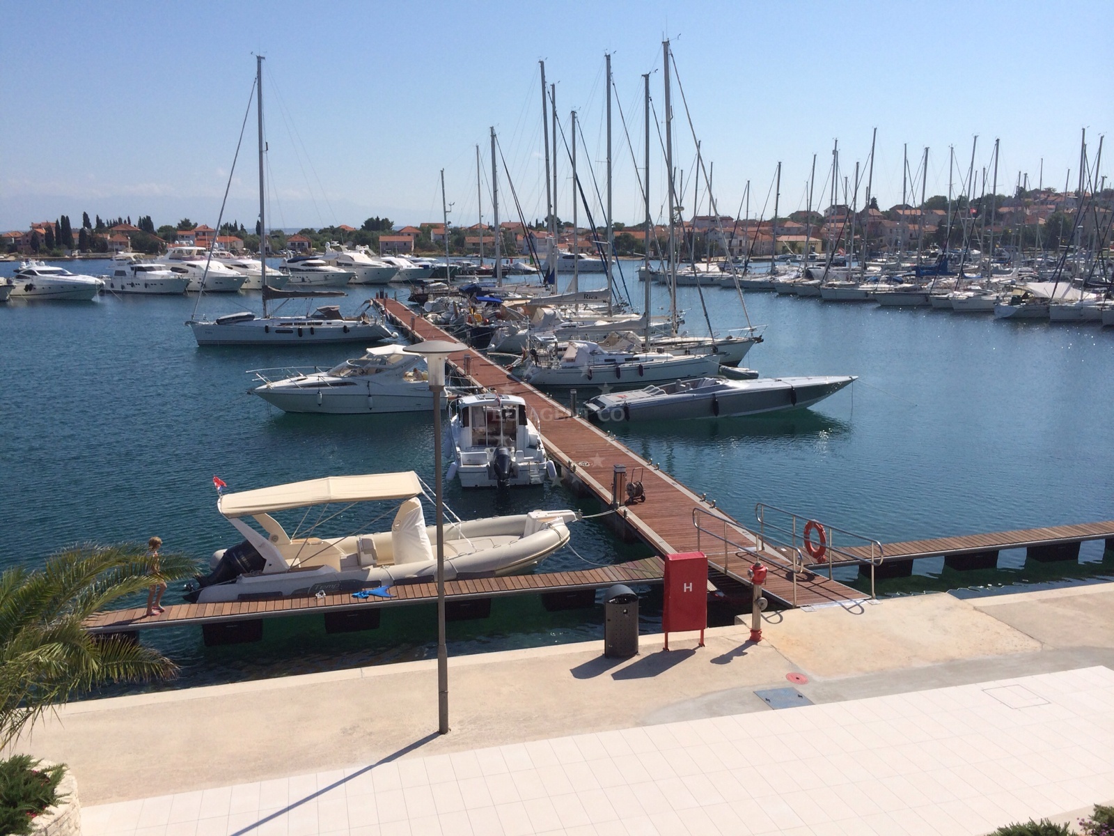 Sutomiscica Harbour, Ugljan, Croatia with boats docked and nearby Olive Island Marina