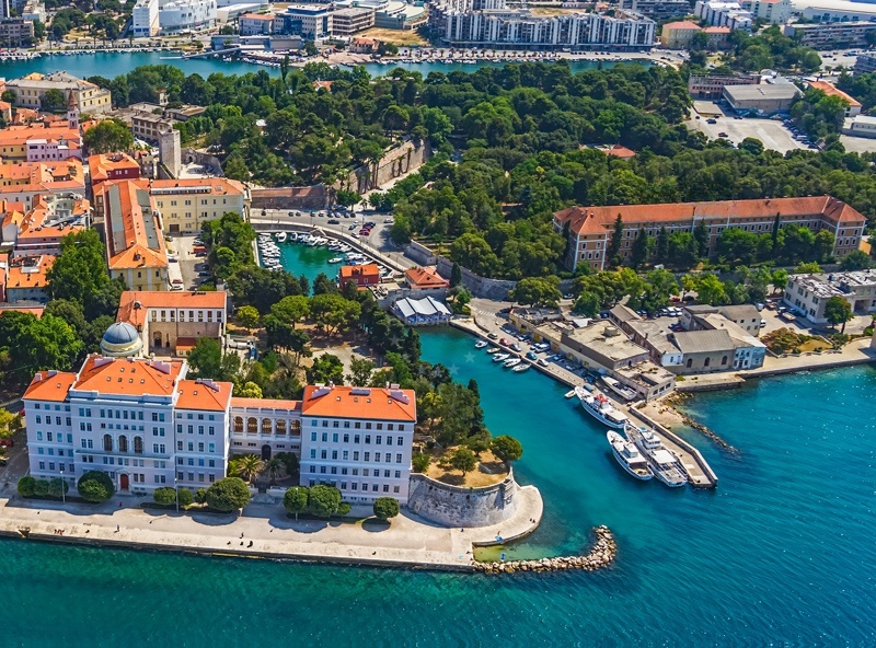 Fosa Harbour in Zadar, Croatia with boats moored near the entrance