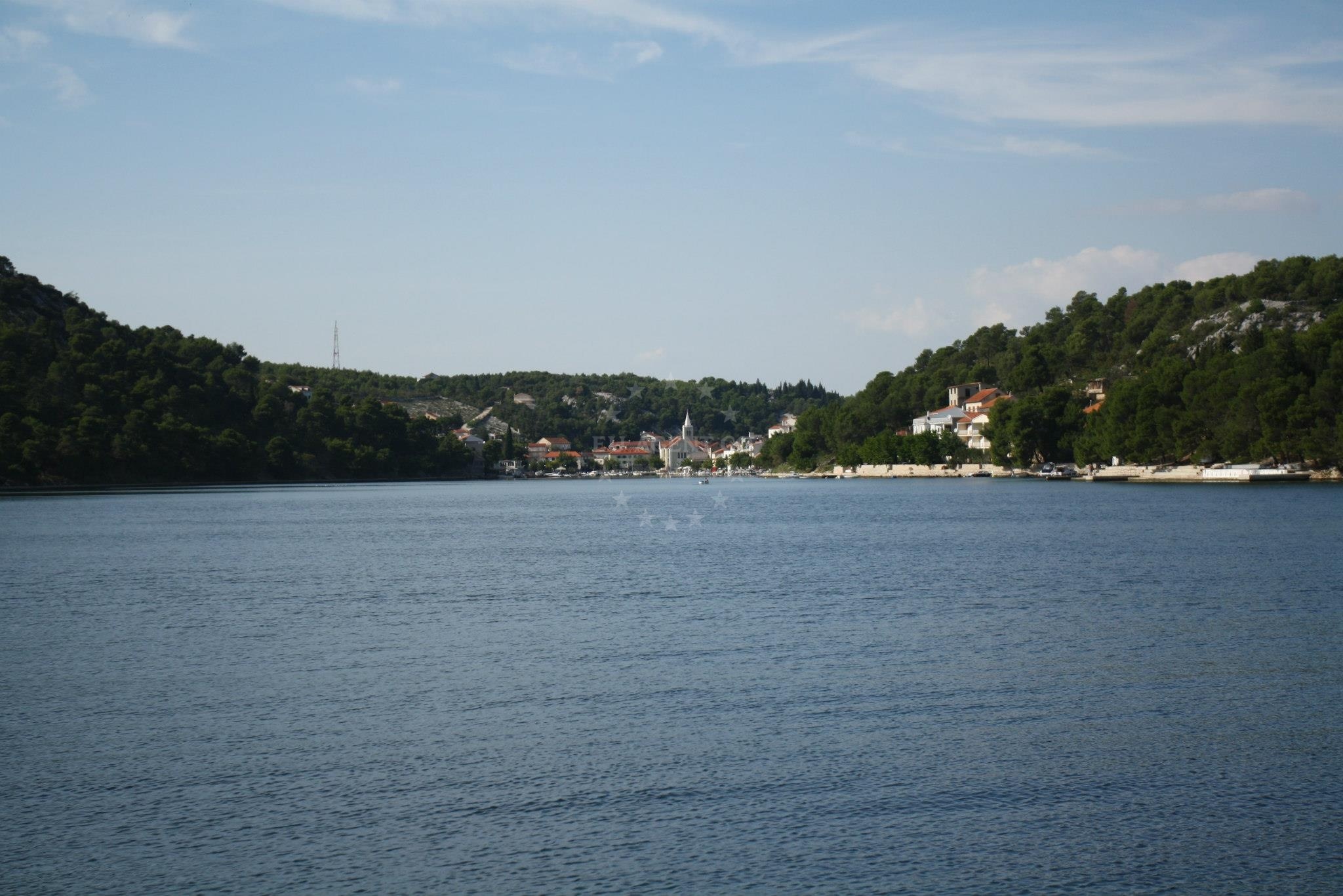 Shallow waters along the Zaton Harbour shoreline