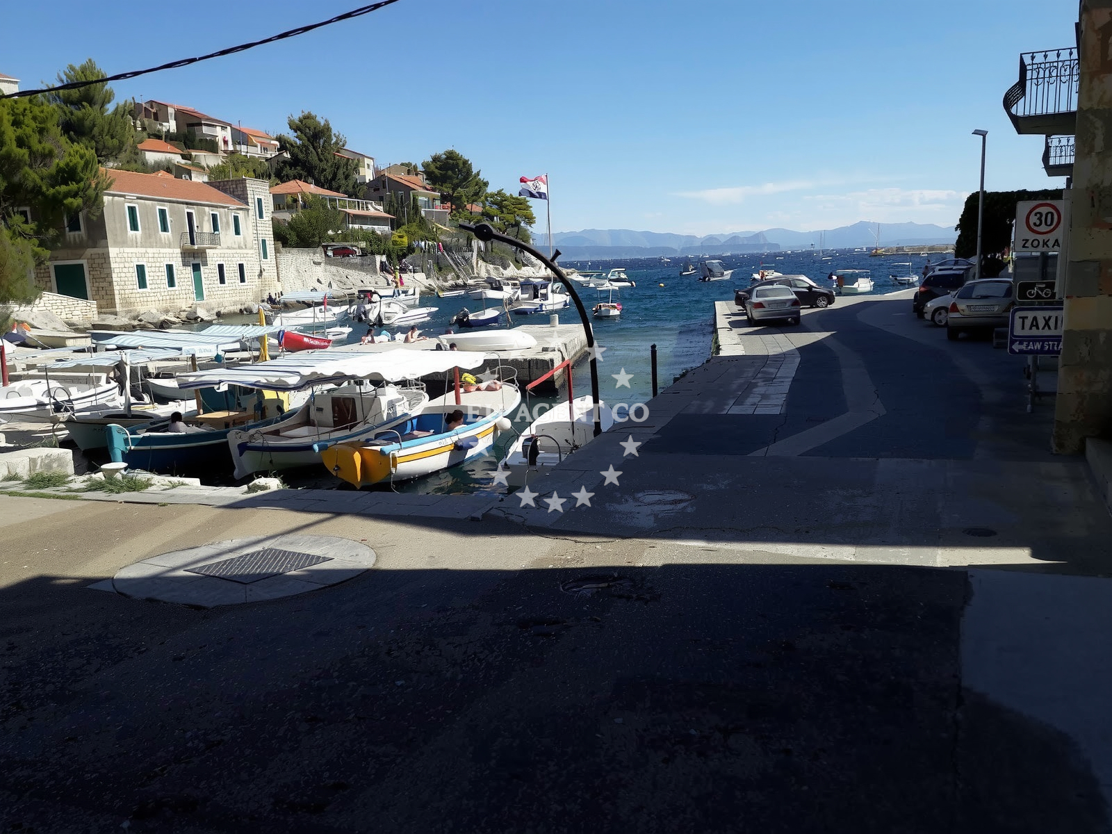 Traditional village of Prigradica on Korčula with boats in the harbor