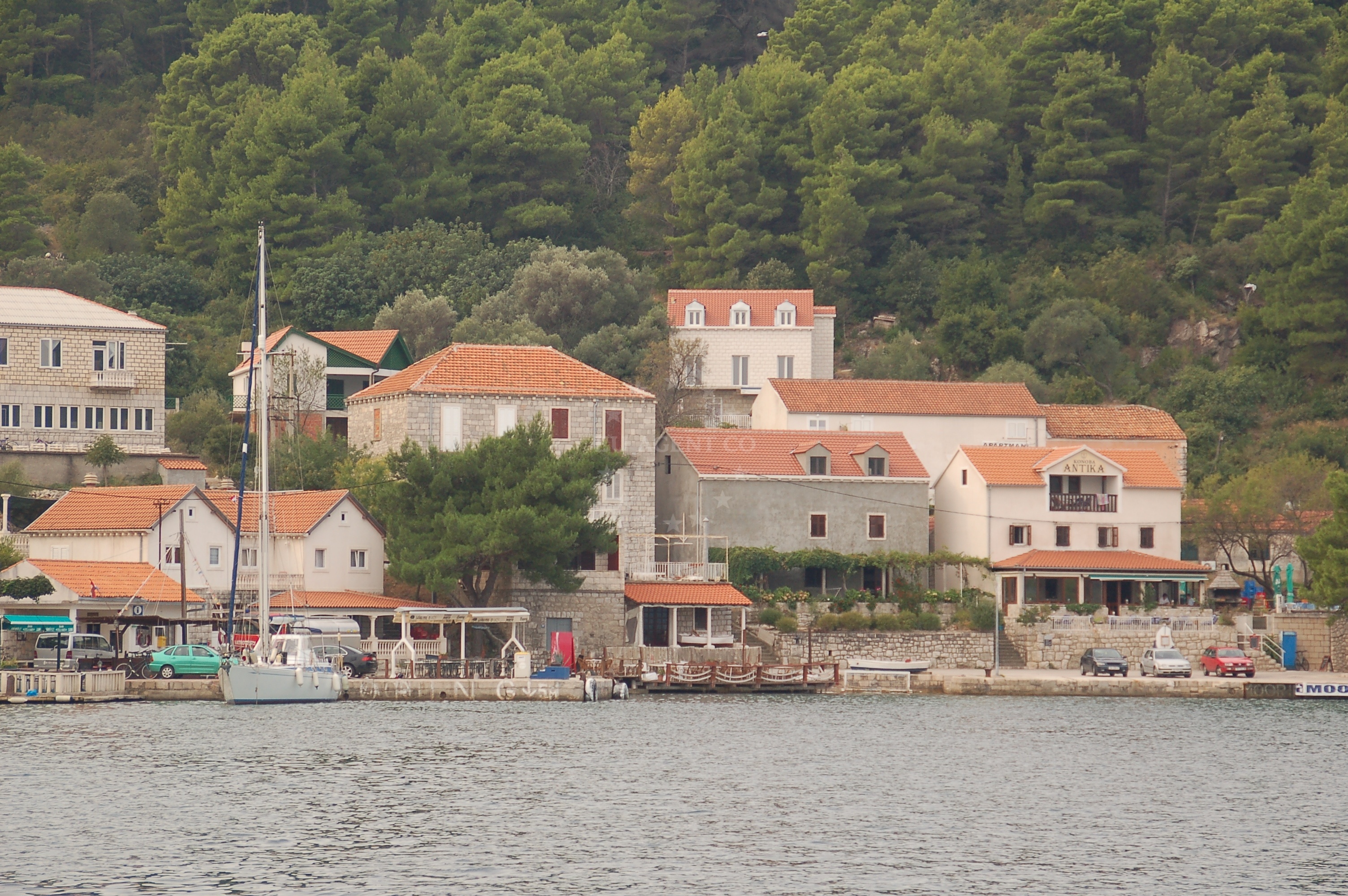 Scenic view of Polace Harbour, Mljet Island, Croatia with boats and surrounding landscape