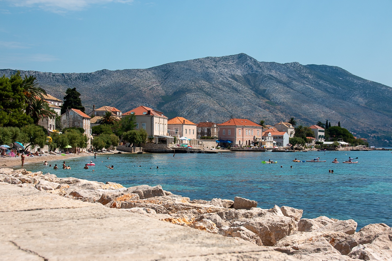 View of Trstenica Bay with reef markers and lighthouse positions