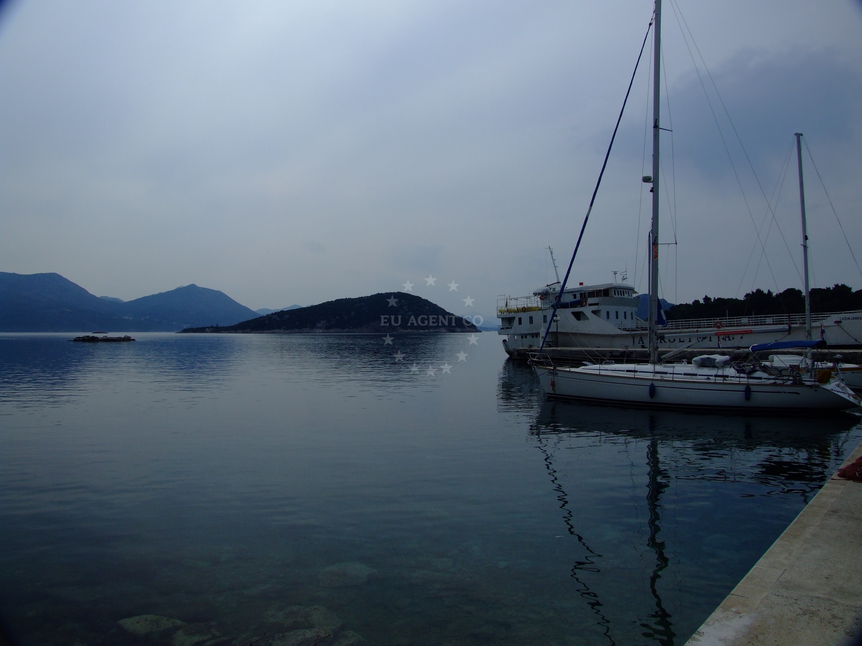 View of Sudurad Harbour from the northern shore, showing nearby rocks