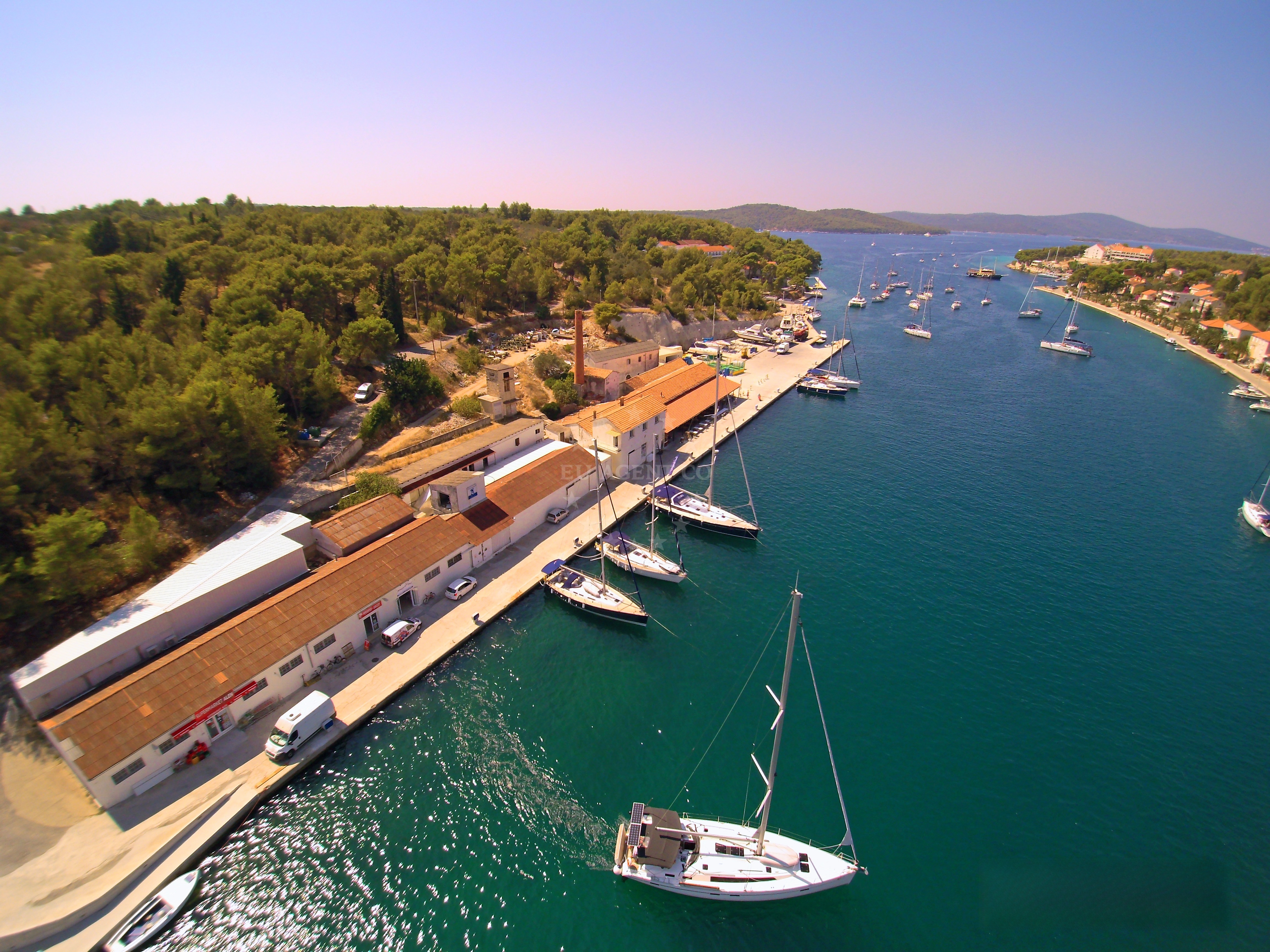 Marina Milna Kanarija, Brač, Croatia: Yachts docked at the marina with views of the Adriatic Sea.