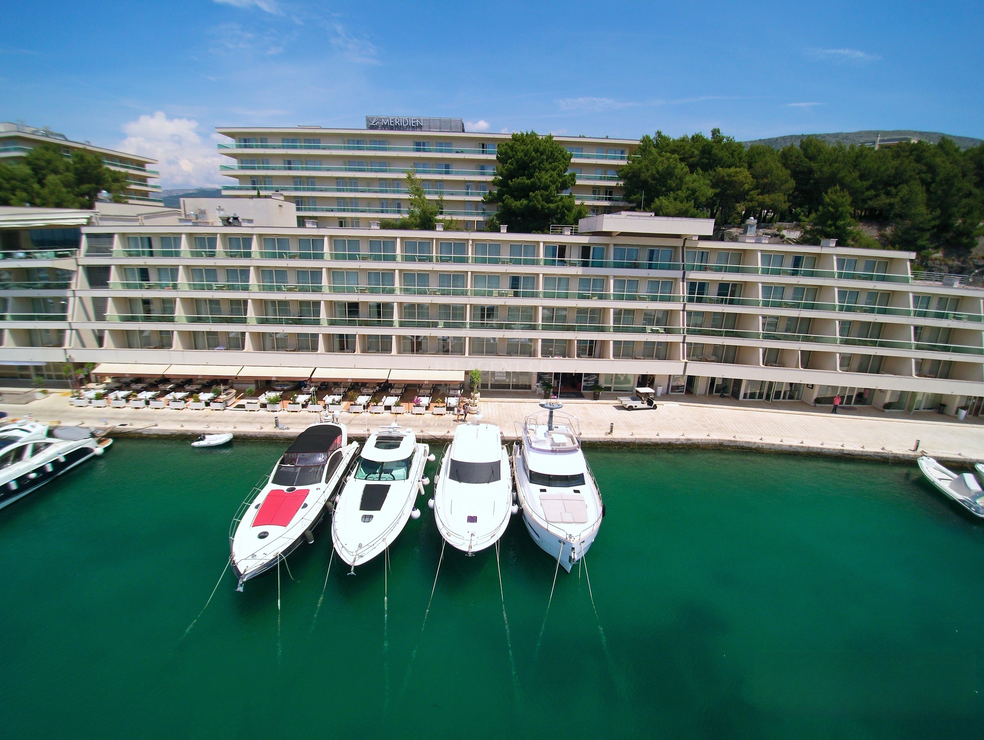 Marina Lav entrance with security and facility signage
