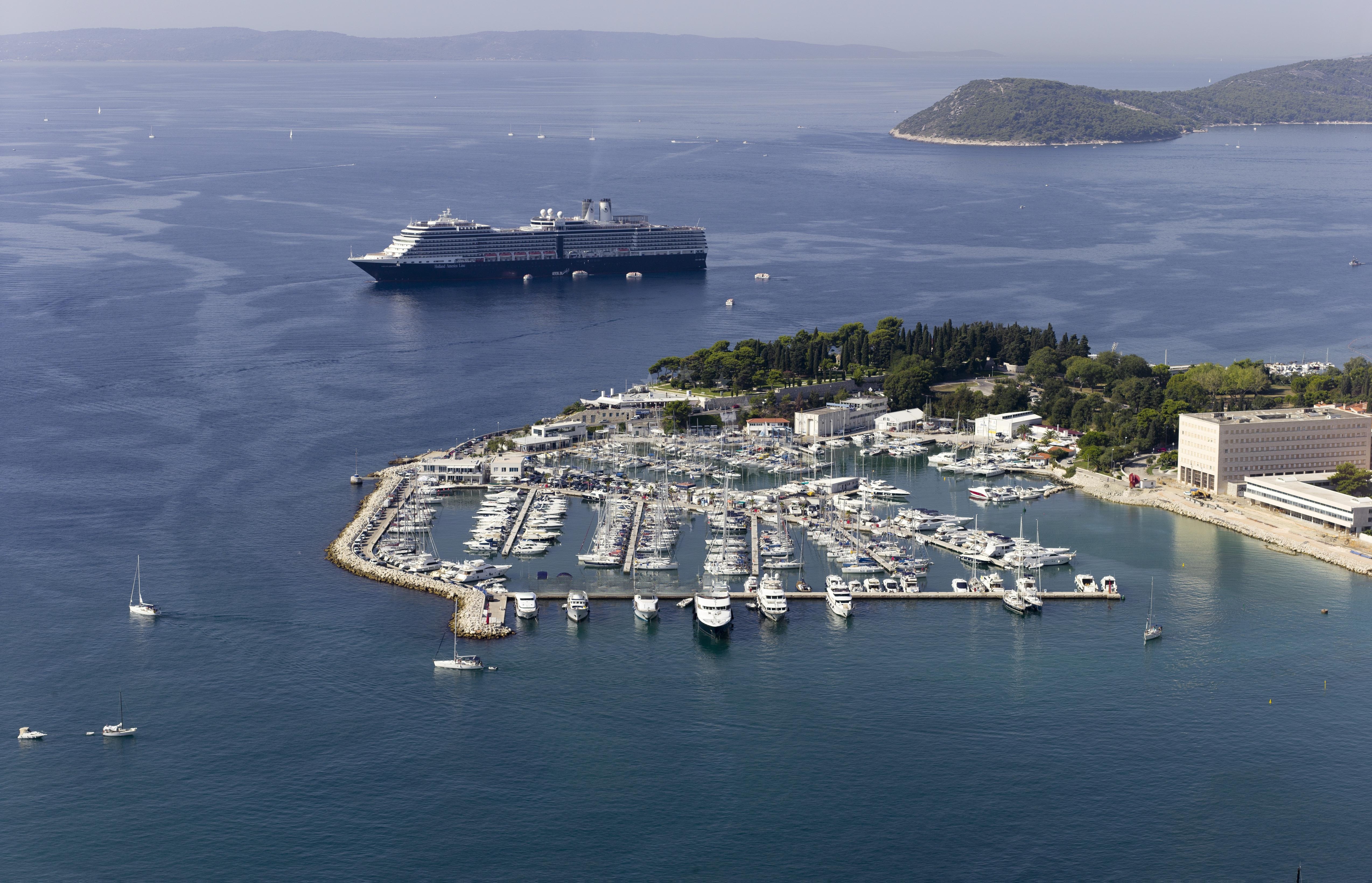 Yachts moored at ACI Marina Split with the Split cityscape in the background