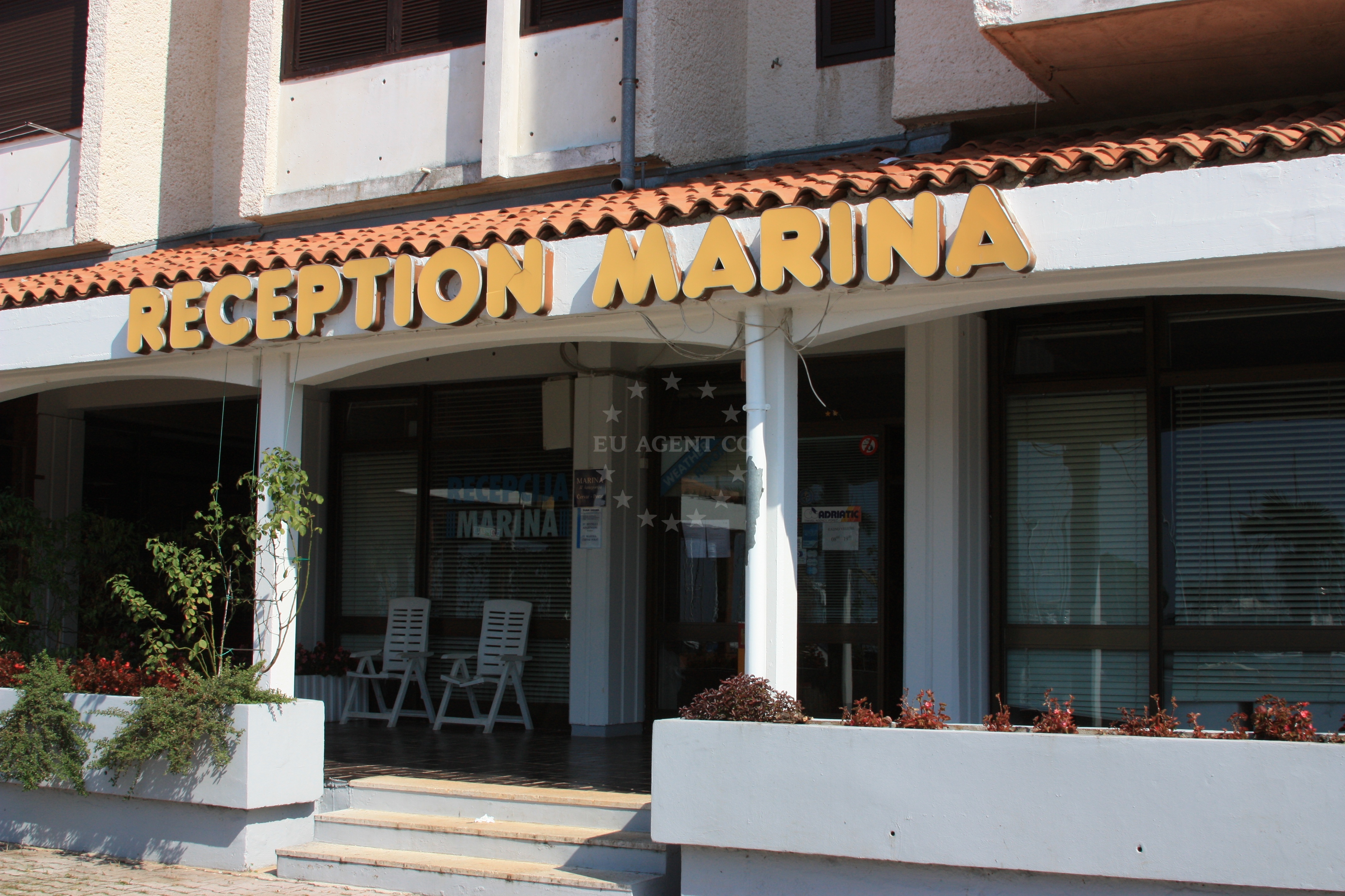 Modern marina facilities with electricity and water connections for yachts