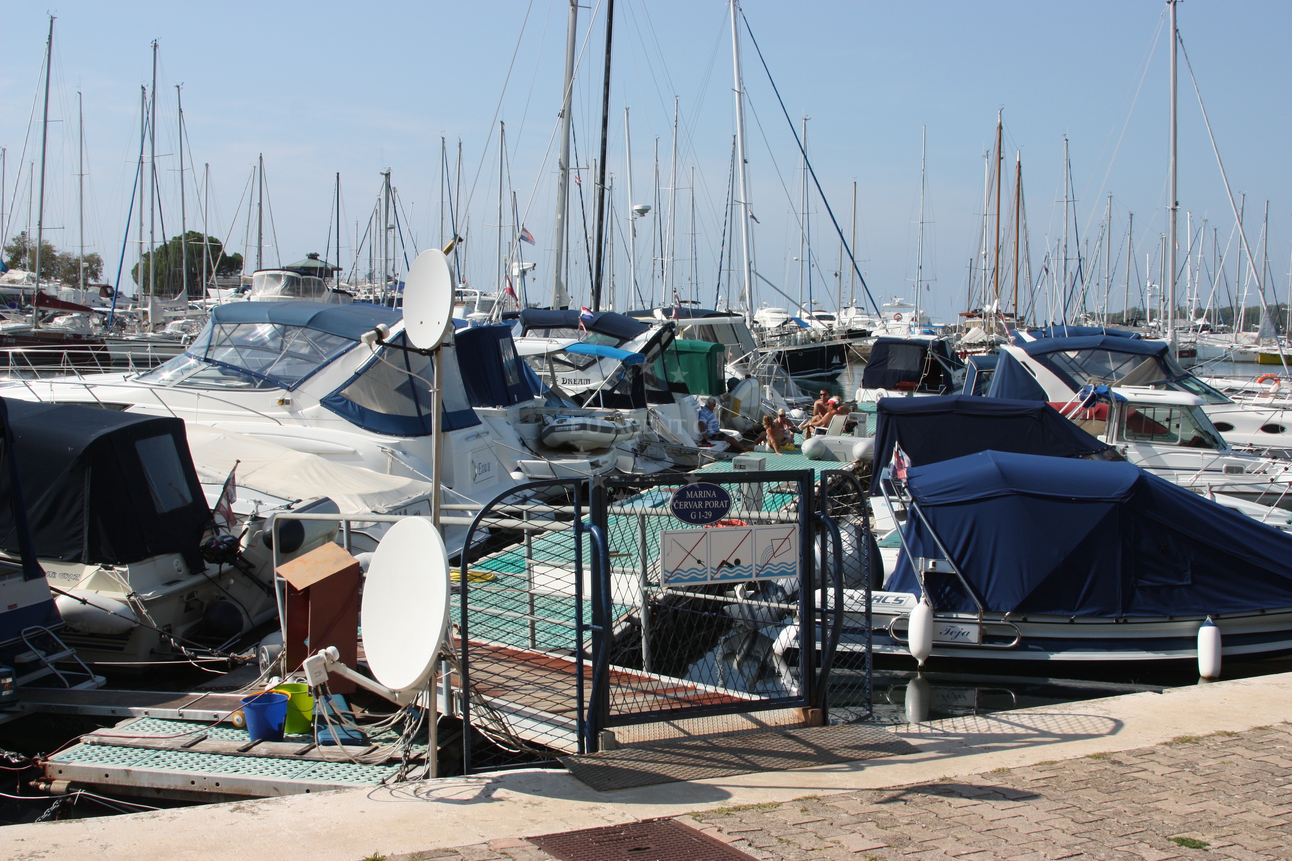 Marina Cervar Porat with quay and surrounding coastal landscape
