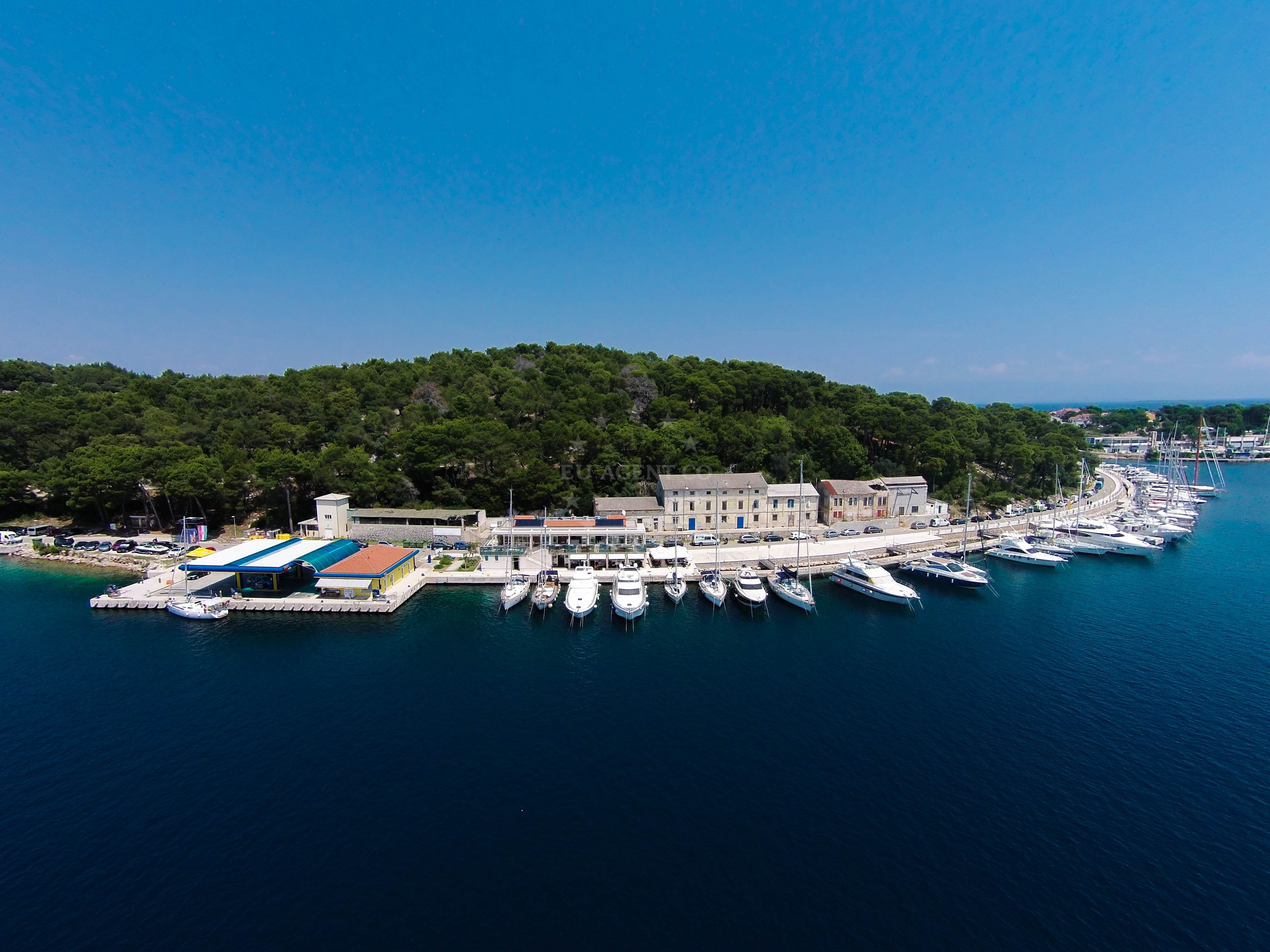 Marina Losinj with yachts docked at the curved quay
