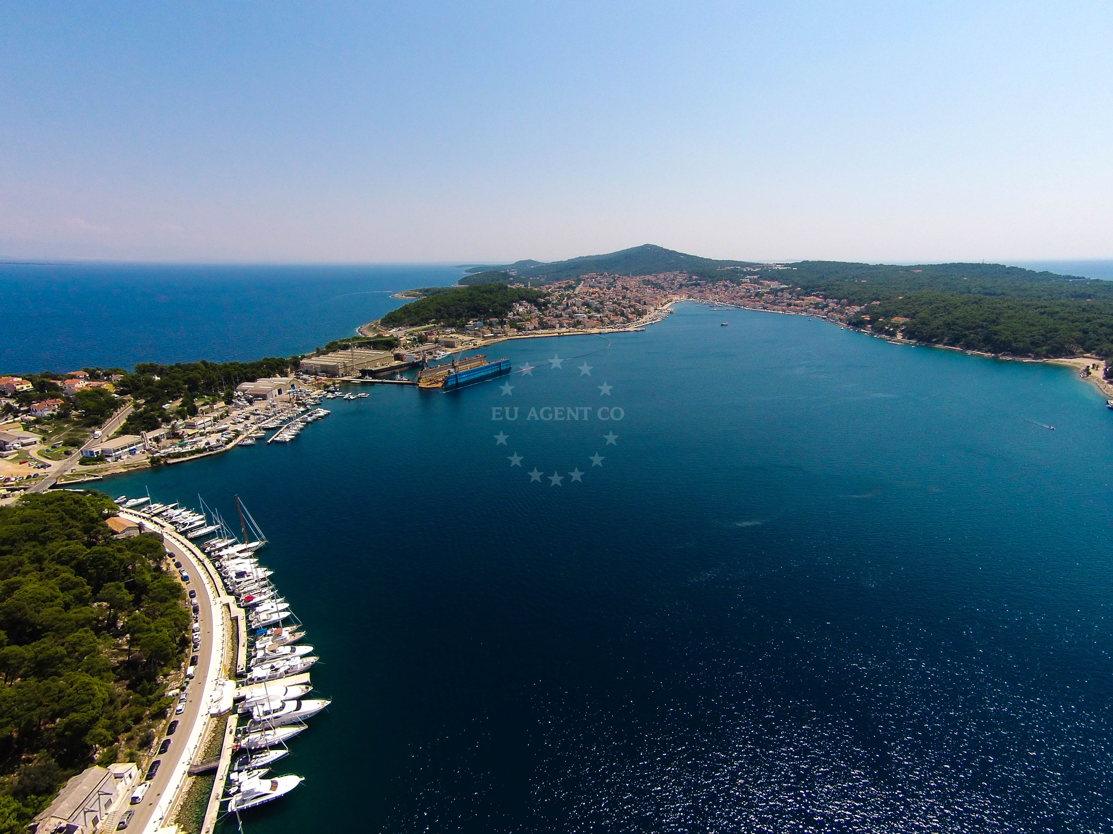 Marina Losinj entrance with breakwater and quay