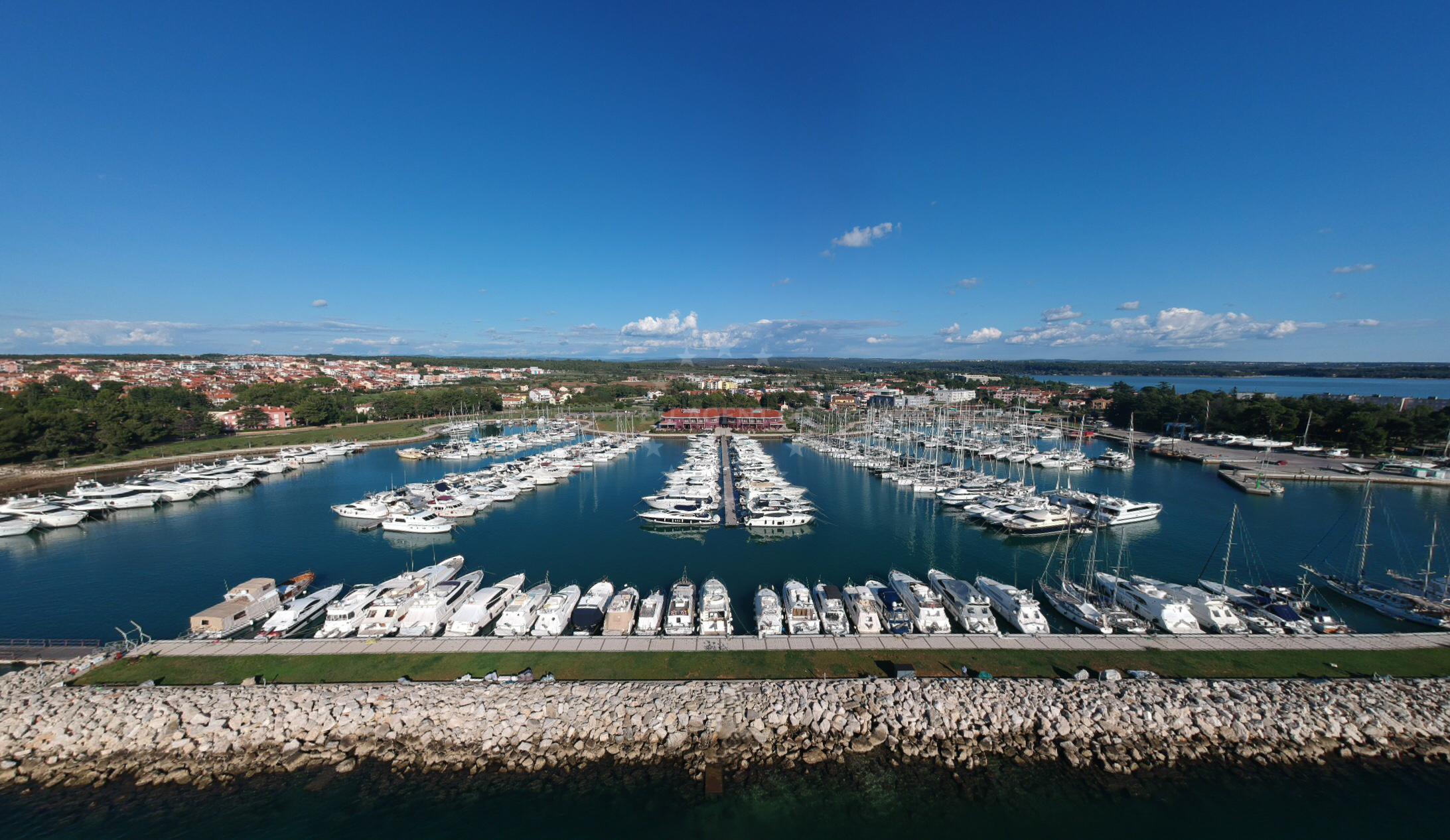 Marina Nautica's waterfront with boats docked