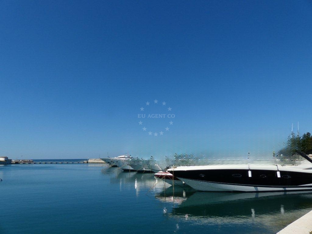 Marina Nautica's waterfront with boats docked