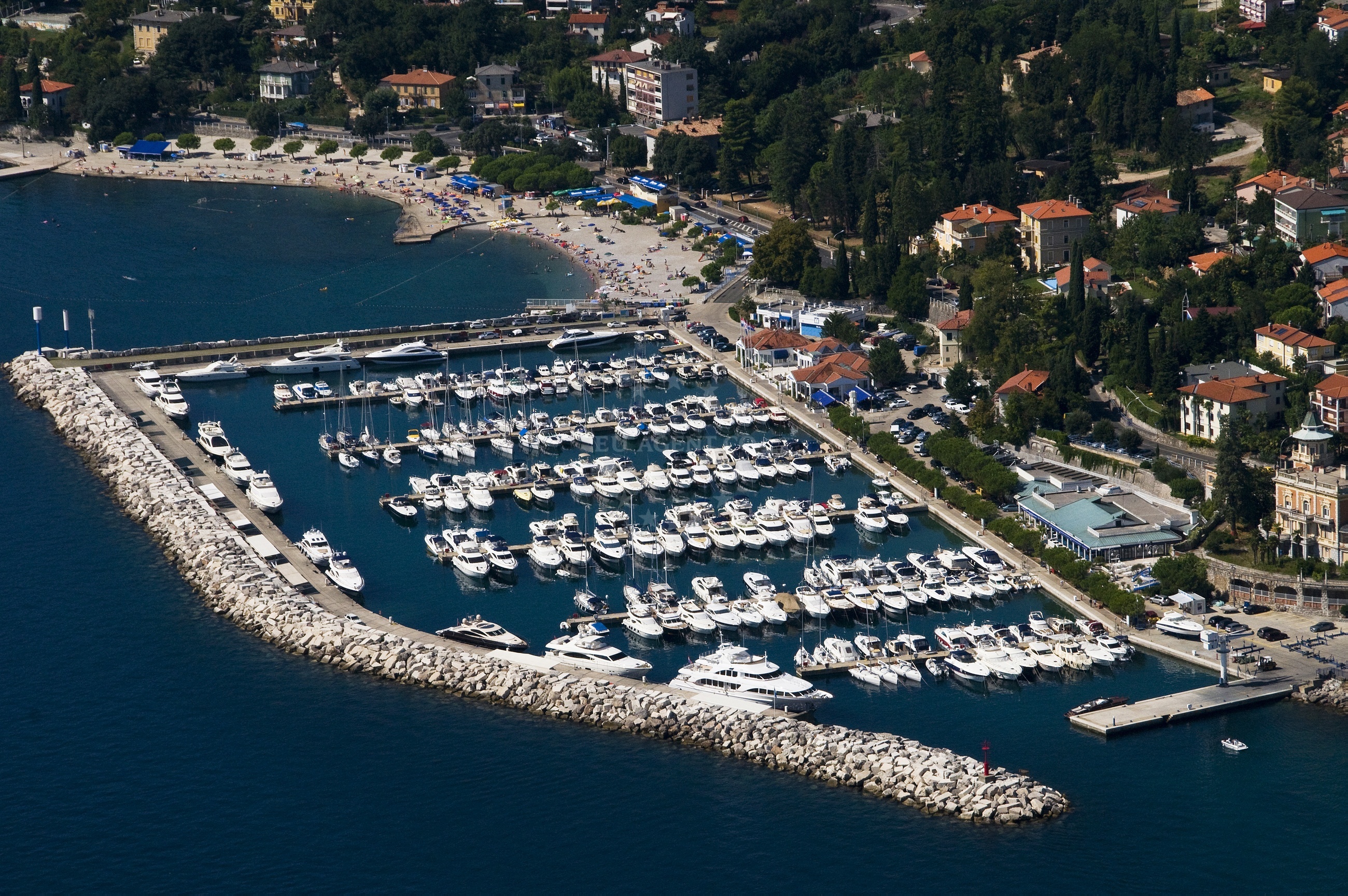 ACI Marina Opatija breakwater and lighthouse (Fl R 3s 7m 3M) in Kvarner Bay, Croatia