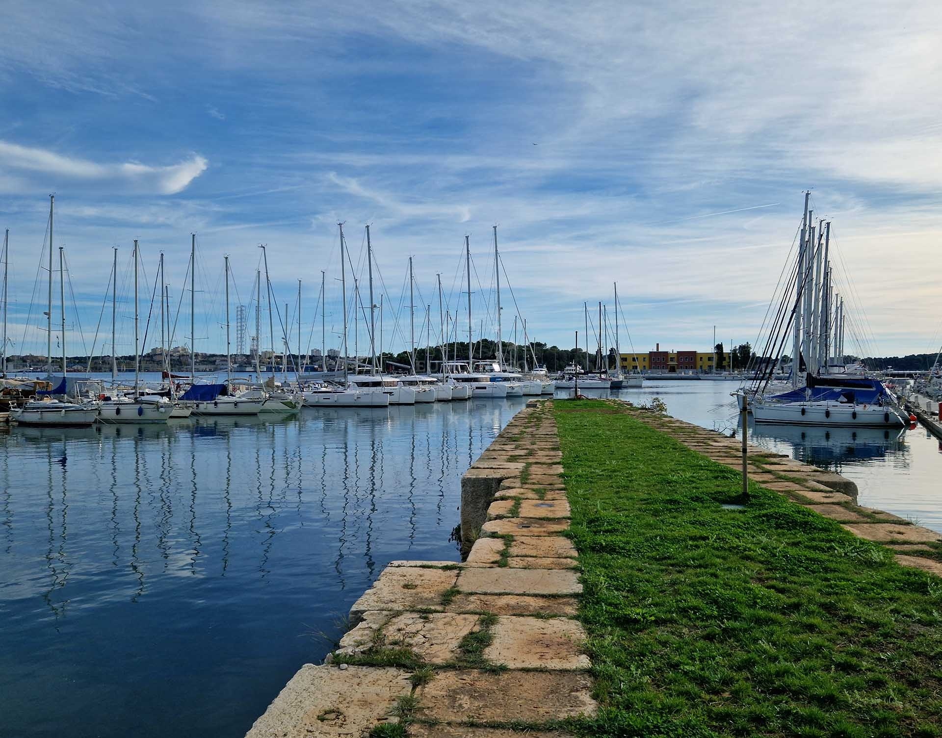 Yachts moored at Marina Polesana's floating jetties