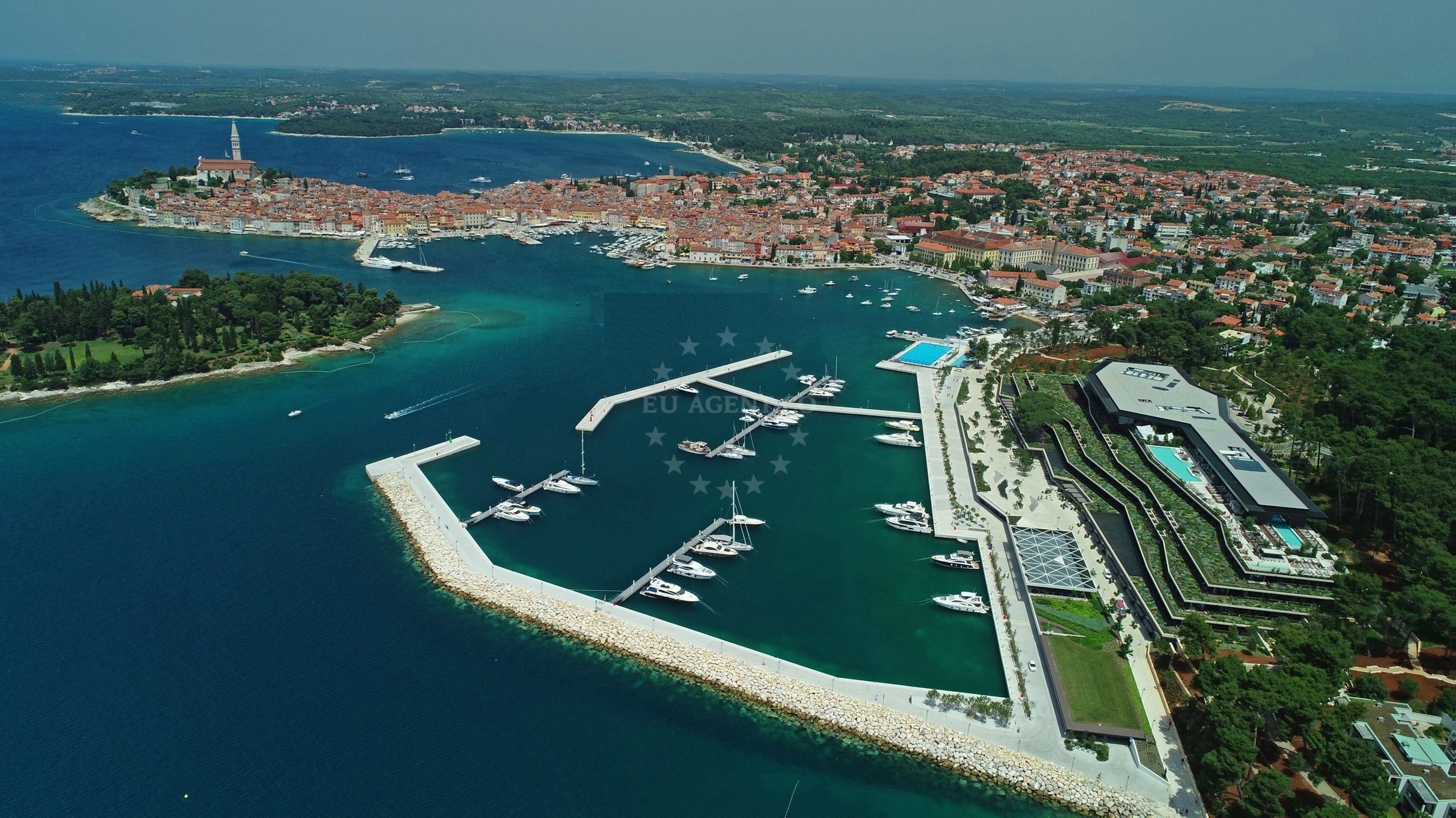 ACI Marina Rovinj, Croatia: Yachts moored at the marina with the Rovinj skyline in the background.