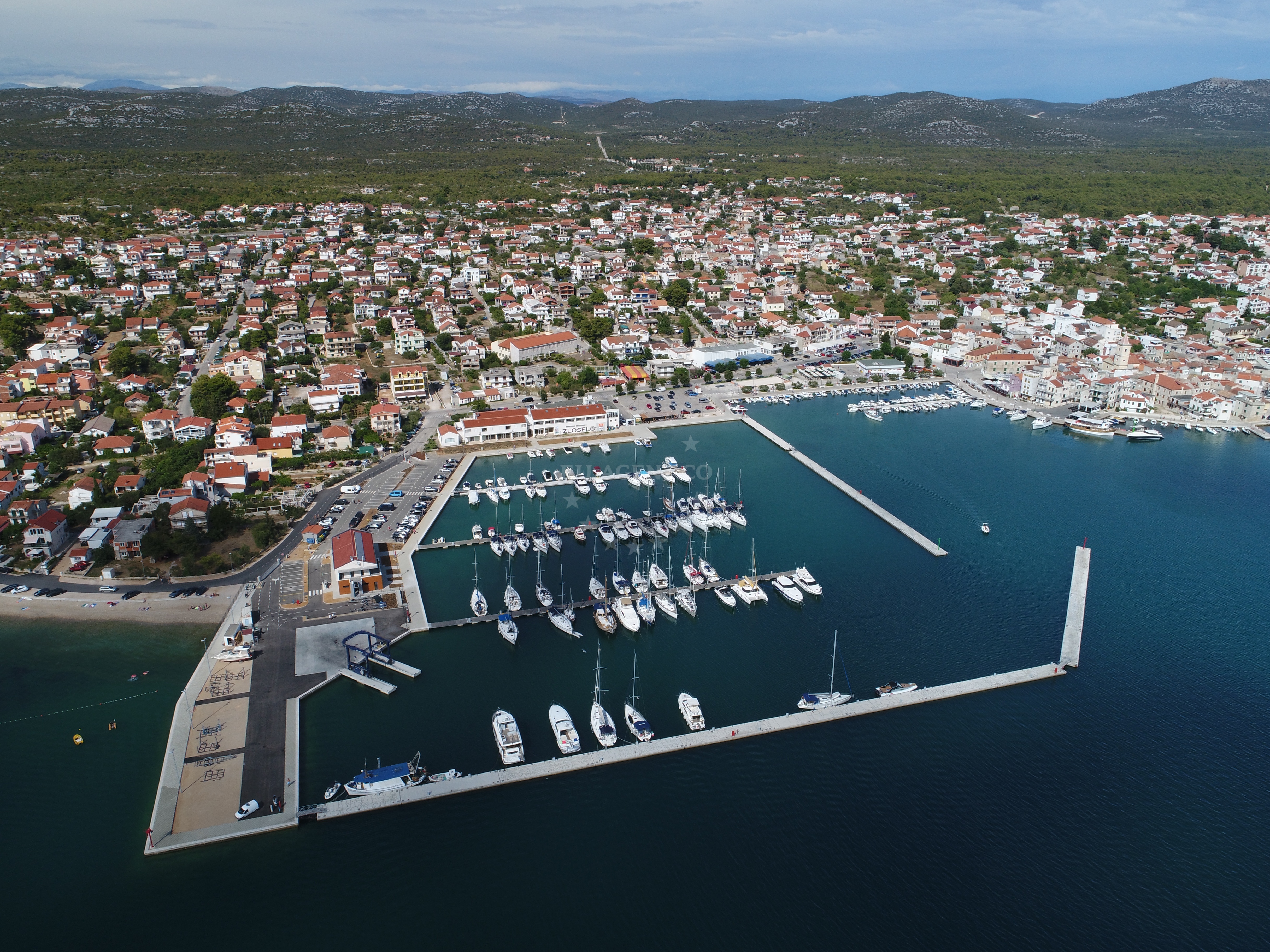 Marina Pirovac's facilities and surrounding coastline