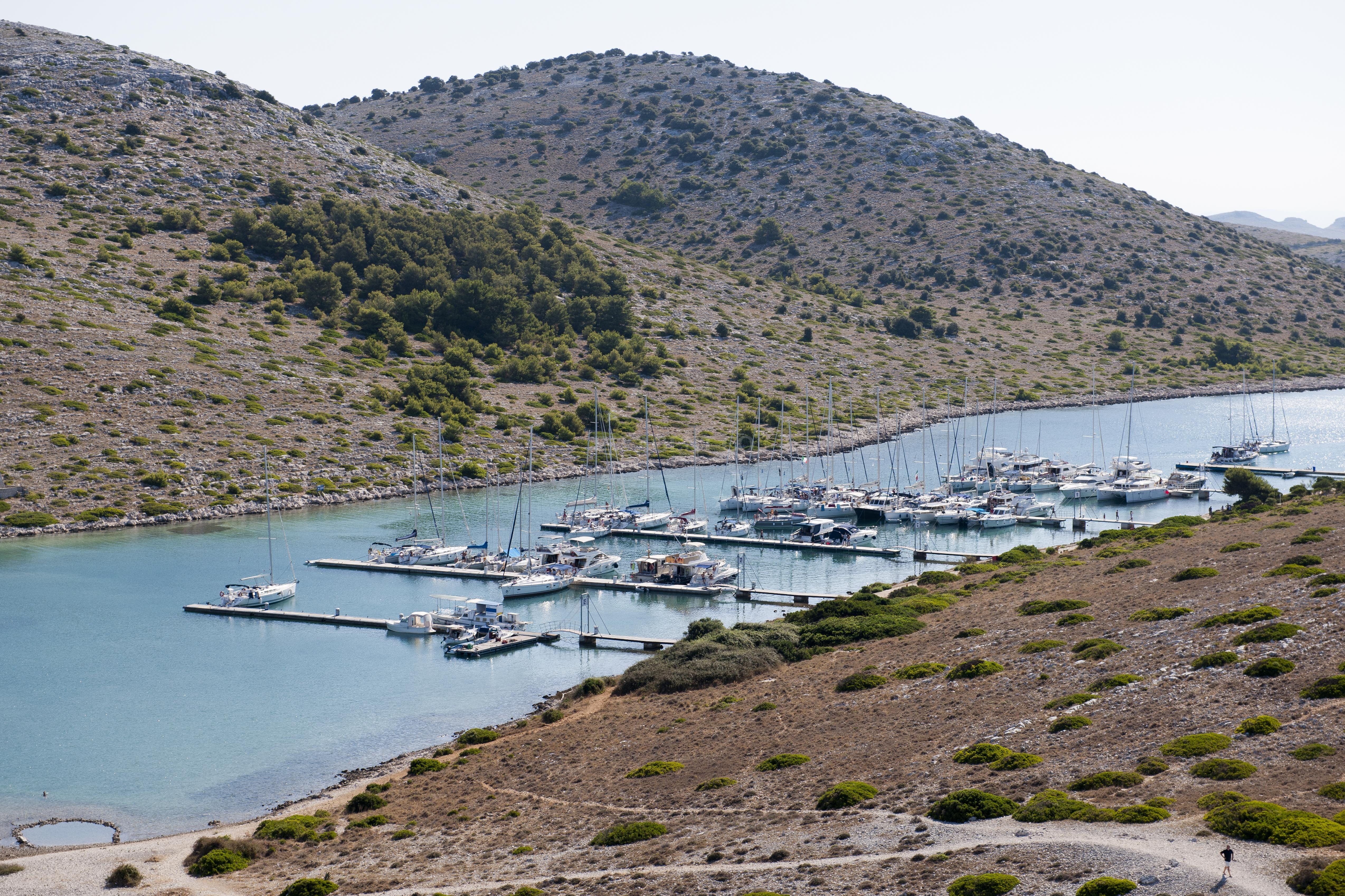 Navigational buoys marking safe channels near ACI Marina Piskera