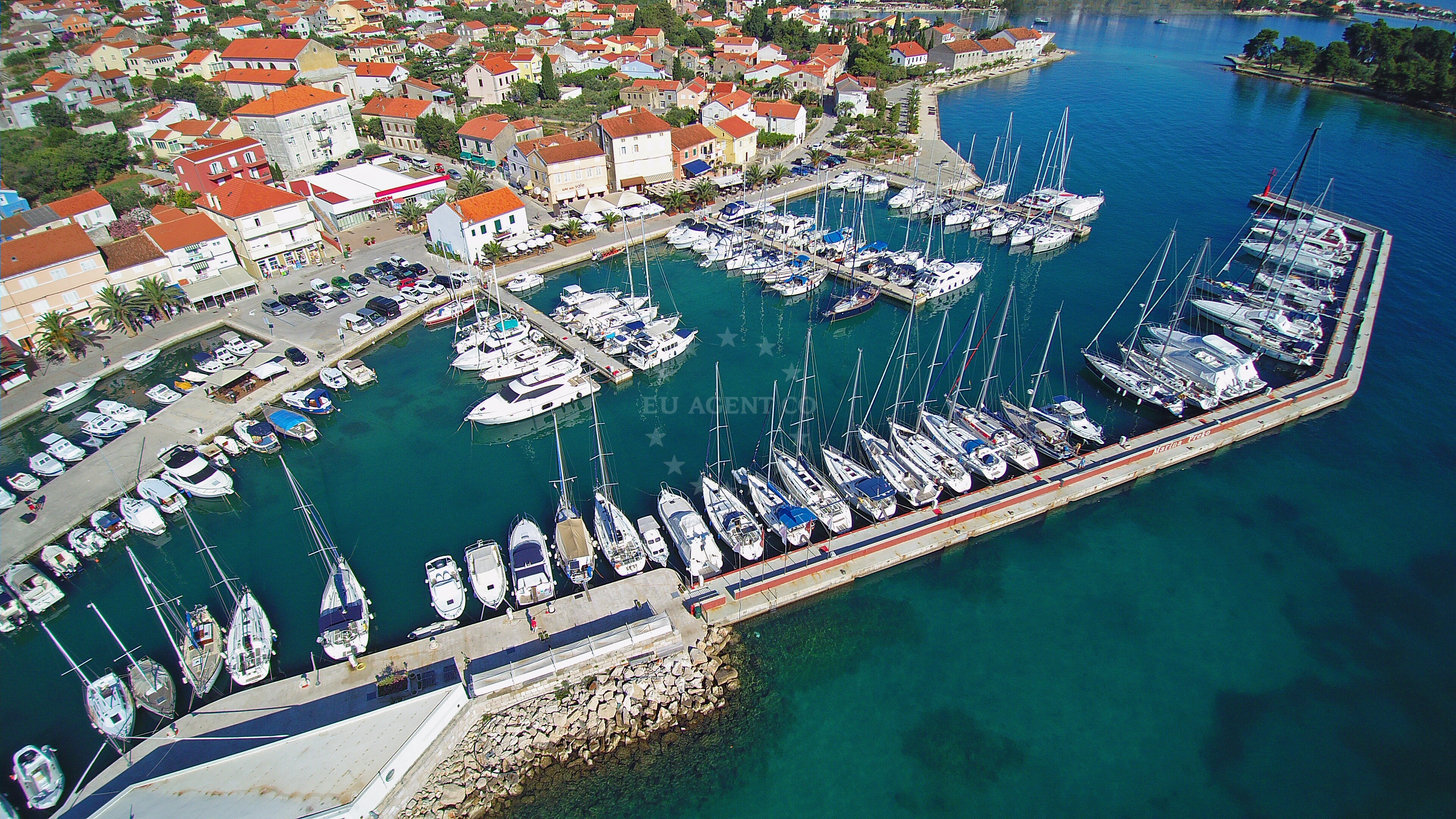 Marina Preko berths with yachts moored along the east coast of Ugljan island