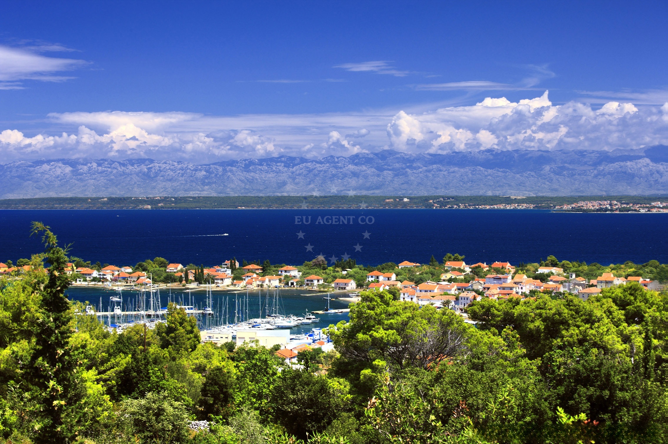 Olive Island Marina in Sutomiscica, Ugljan, Croatia with yachts moored in a sheltered bay