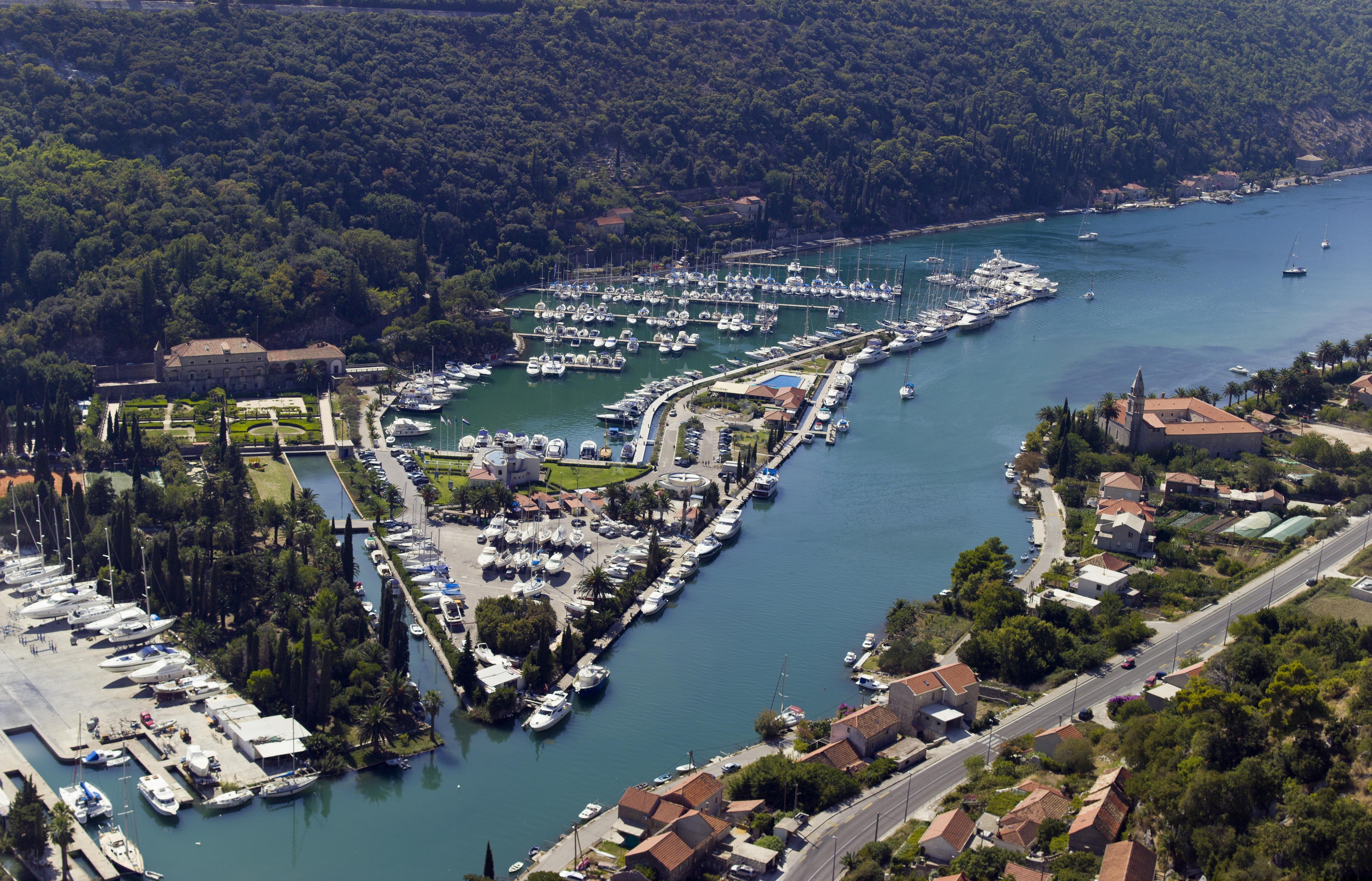Marina entrance with red signal beacons