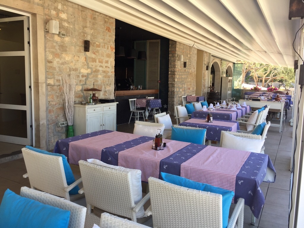 Upscale restaurant Navigare in Milna, Brac, with stone house and winter garden